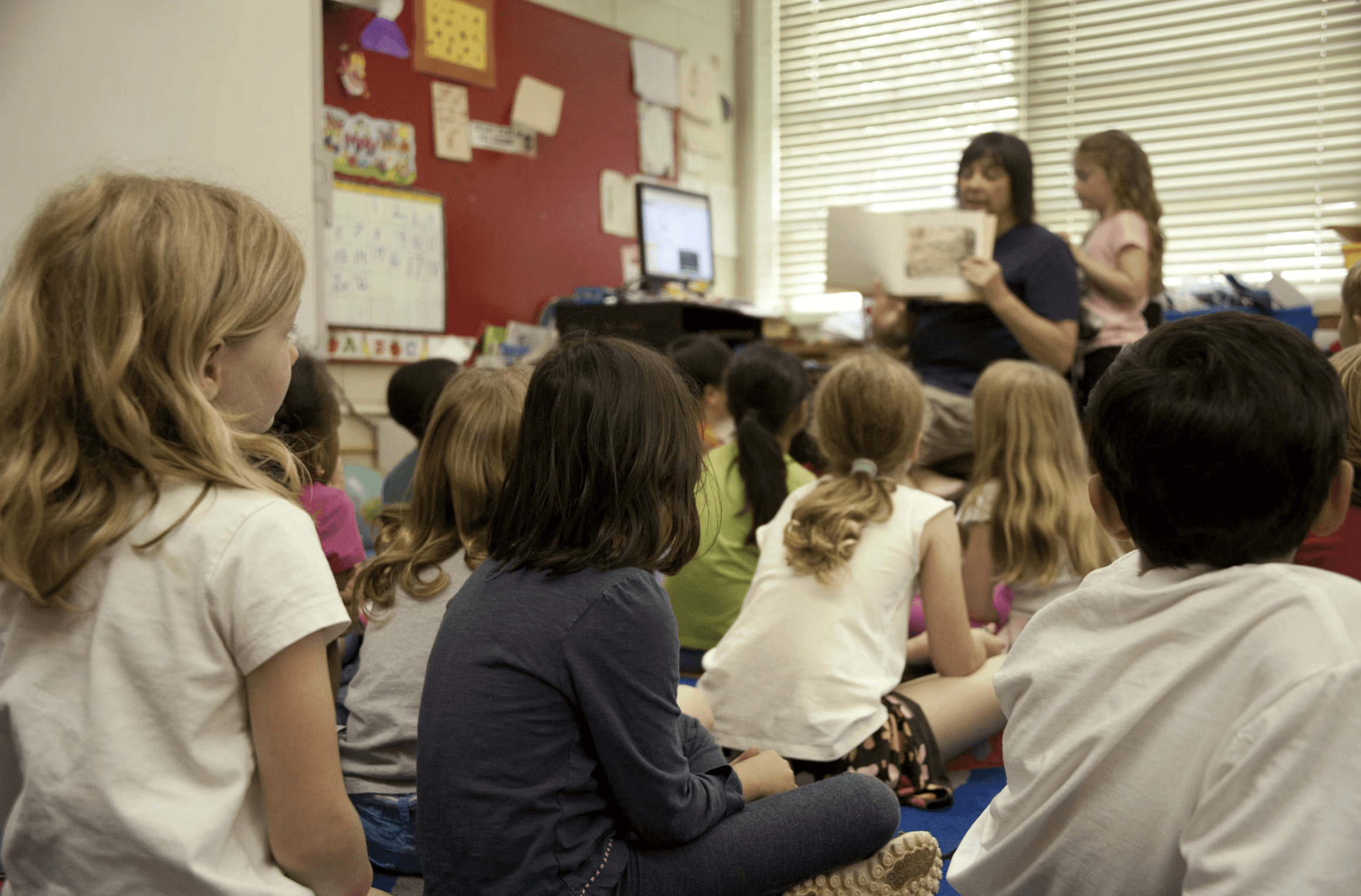 teacher reading to classroom