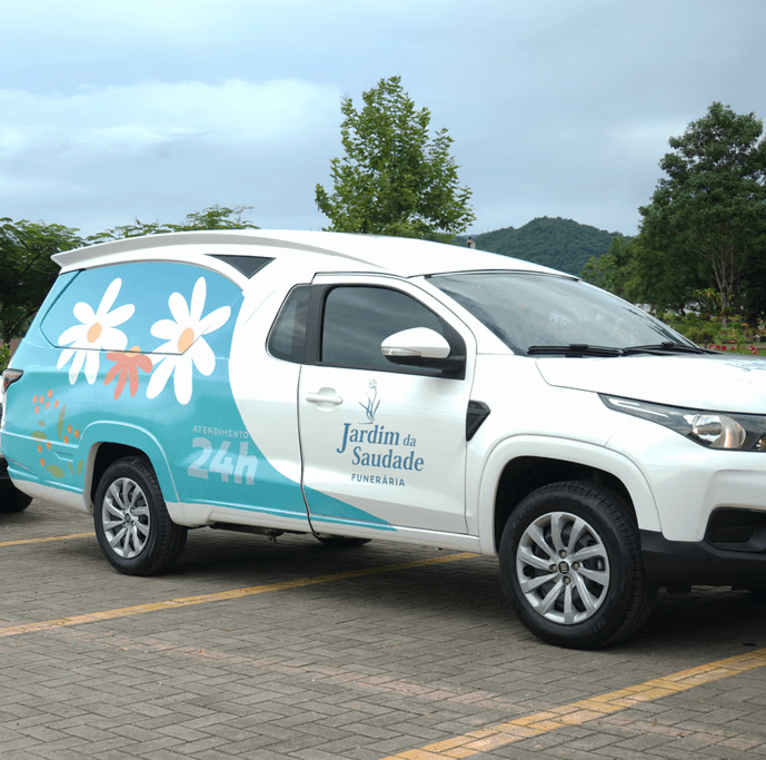 man in white shirt carrying girl in gray shirt