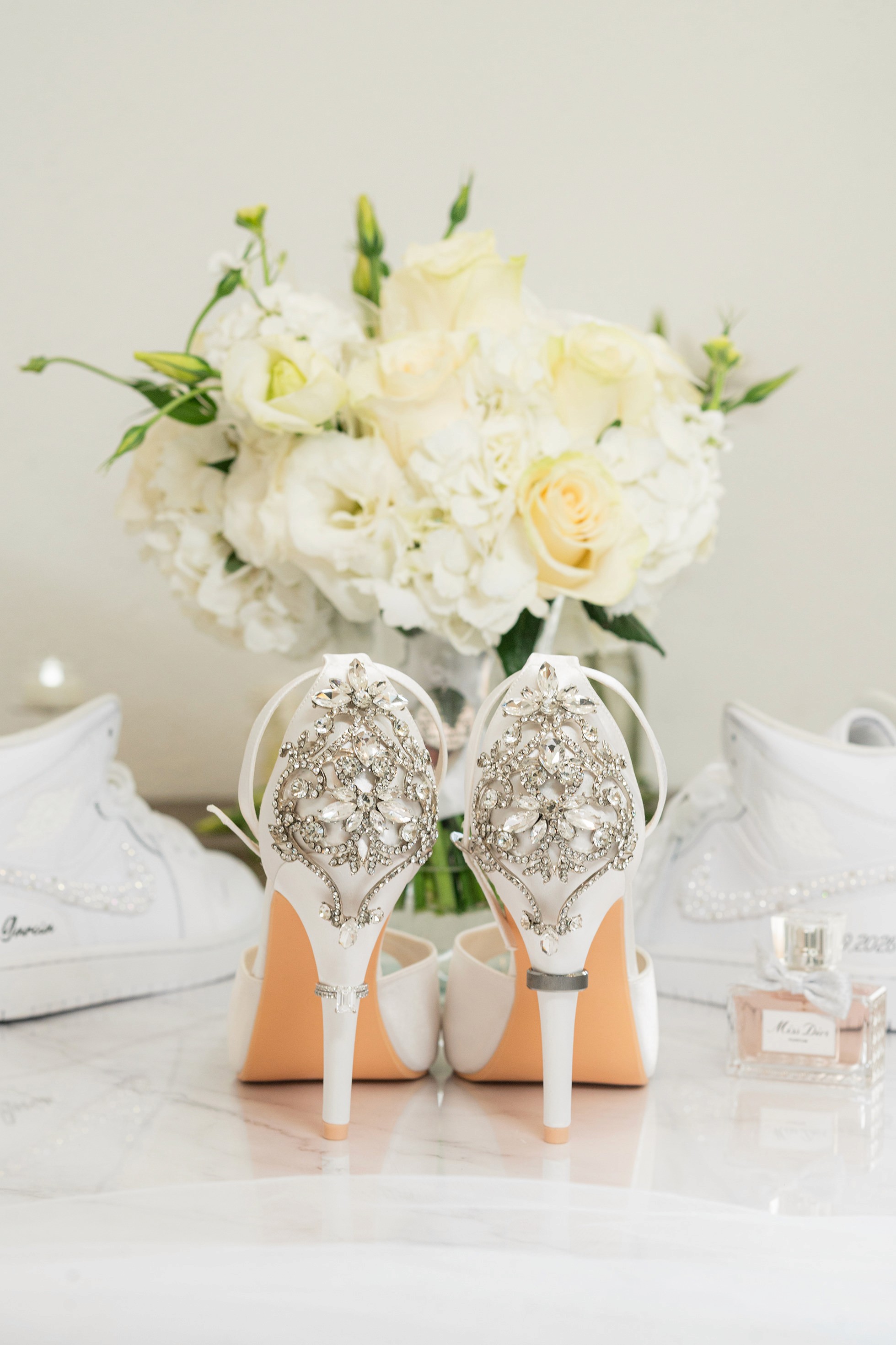 Custom pearl wedding Jordans with Mrs Garcia text and wedding date