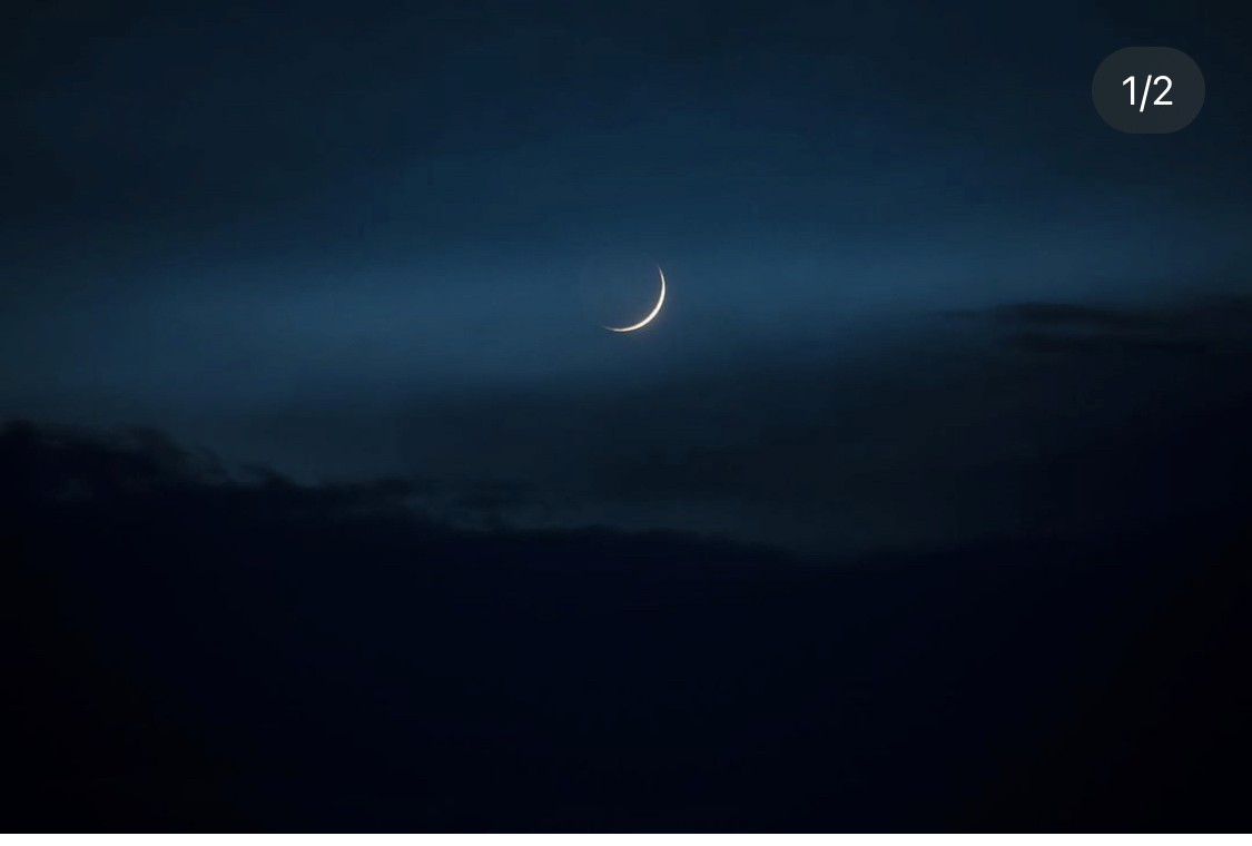 Drone shot of a running track at night