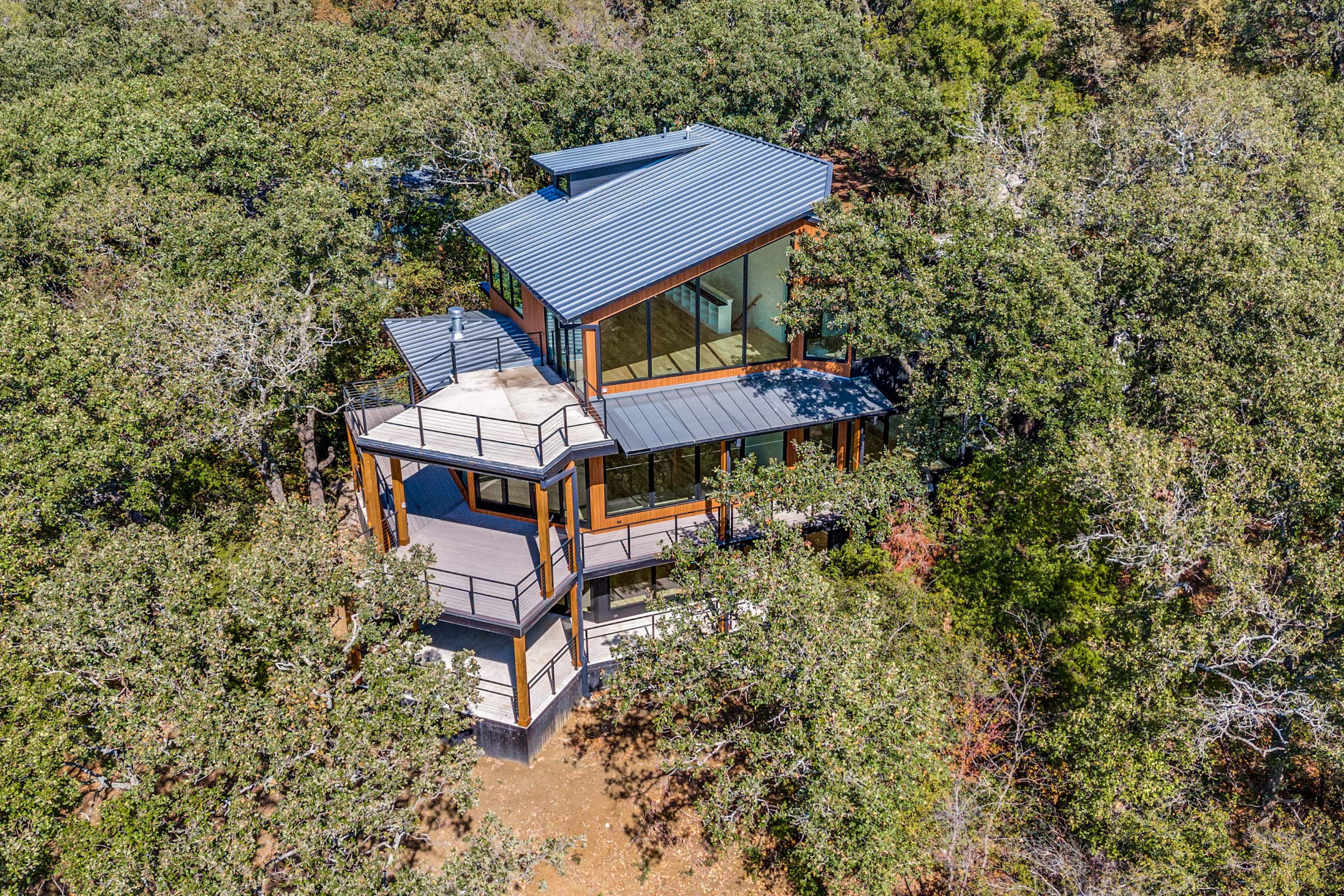 modern lake house aerial view