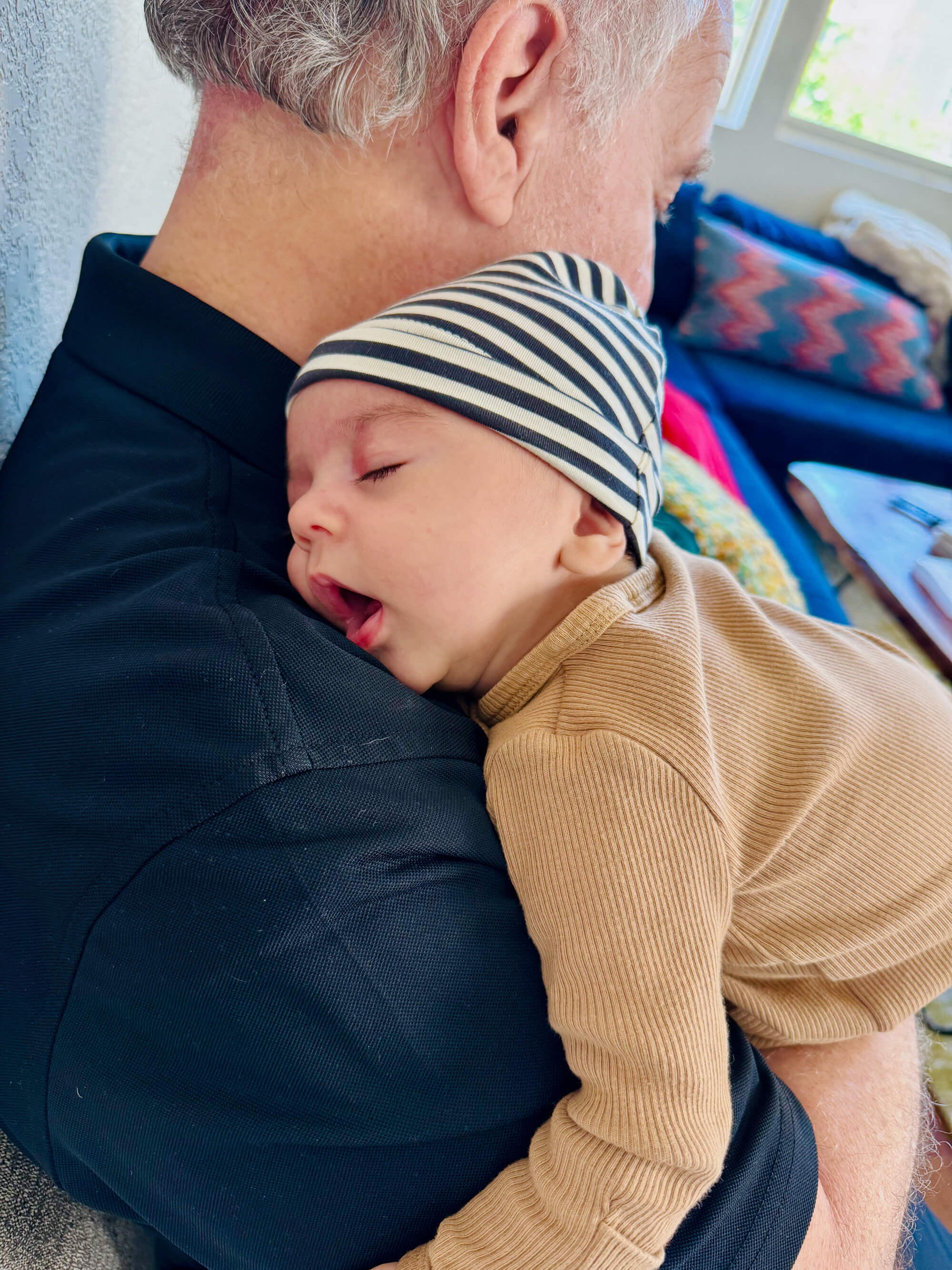 Sleeping on grandpa's shoulder