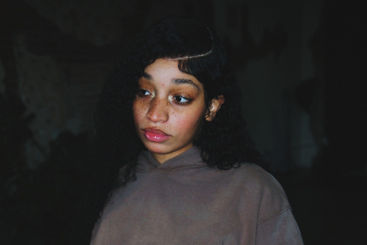 photo of girl posing with a cozy by mari crop top that say's phobia on the front