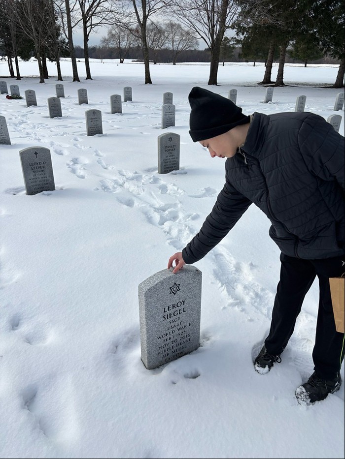 Ephren Tabankin, son of Albany Post 105 member Shawn Tabankin, places a memorial stone at the Gerald B.H. Solomon Saratoga National Cemetery in Schuylerville. This was the third consecutive year that JWV was able to conduct its remembrance during the holiday season.
