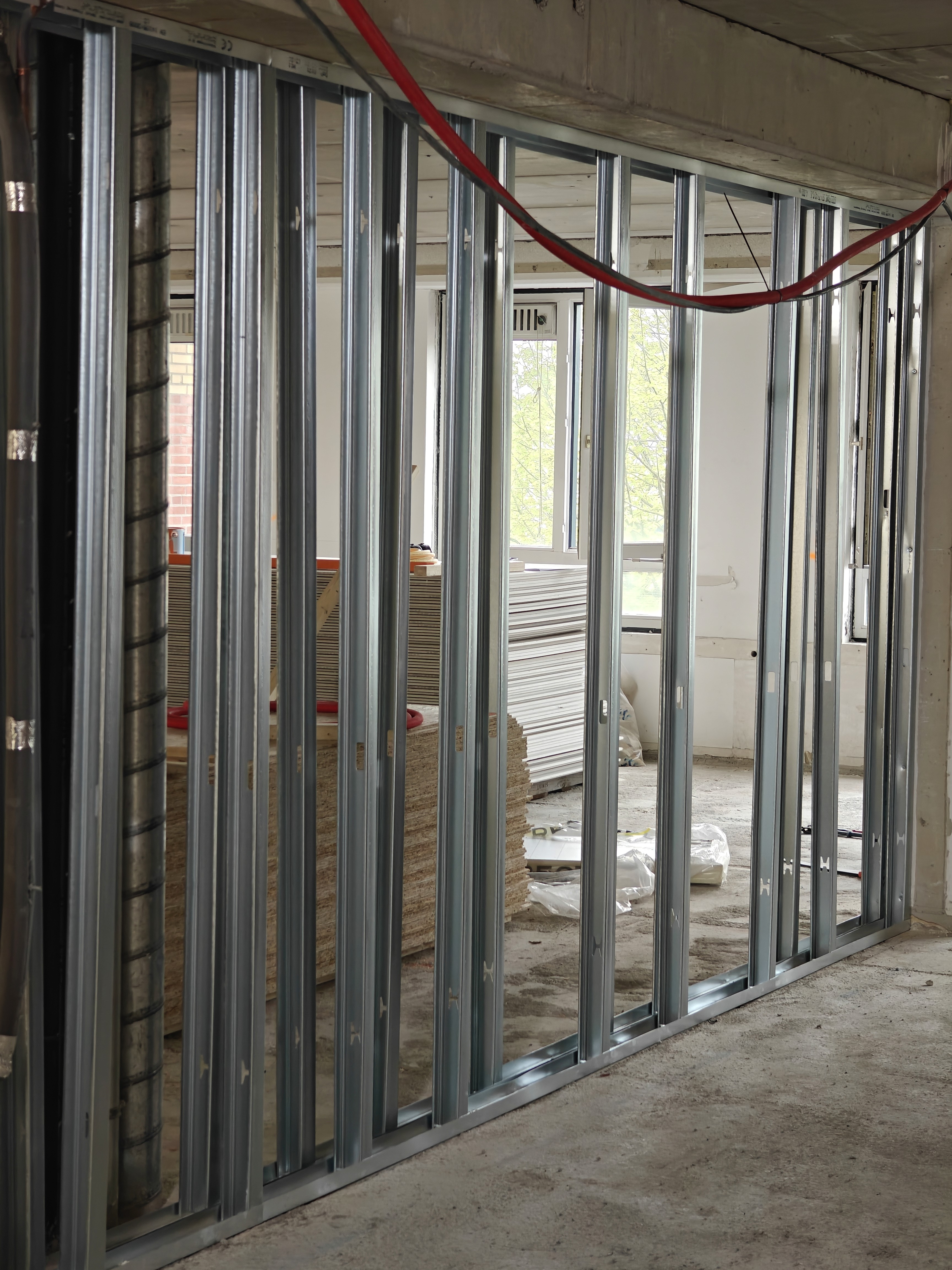 white wooden shelf near white wall
