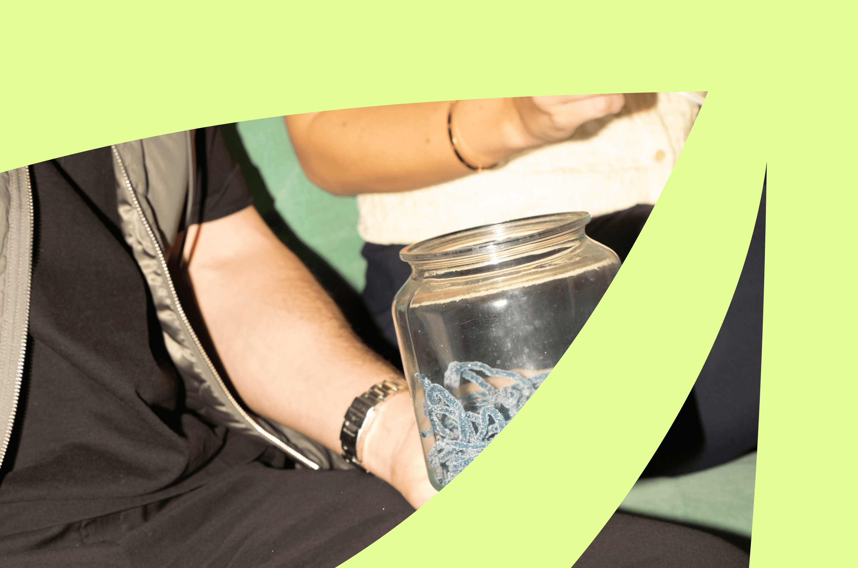 Two people mid-conversation, sharing something tangible — a simple moment framed by bold shapes. Person-based marketing works the same way: real humans, real context, real signals. Not anonymous accounts. Not faceless funnels. Just relevance, delivered one person at a time.