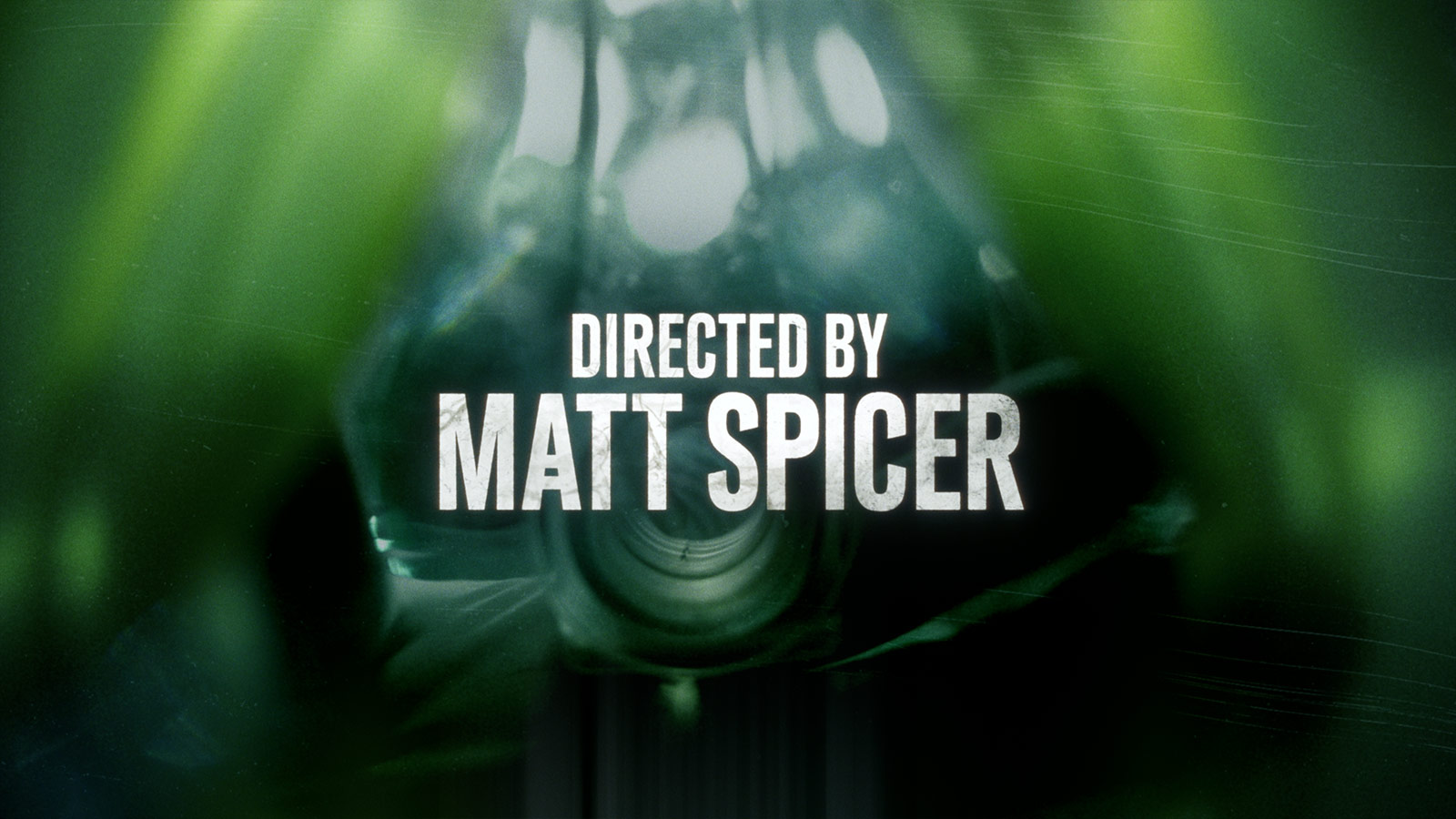 The sequence concludes with a surgical breathing mask being placed on someone, accompanied by ‘Directed by Matt Spicer,’ adding a clinical horror element.