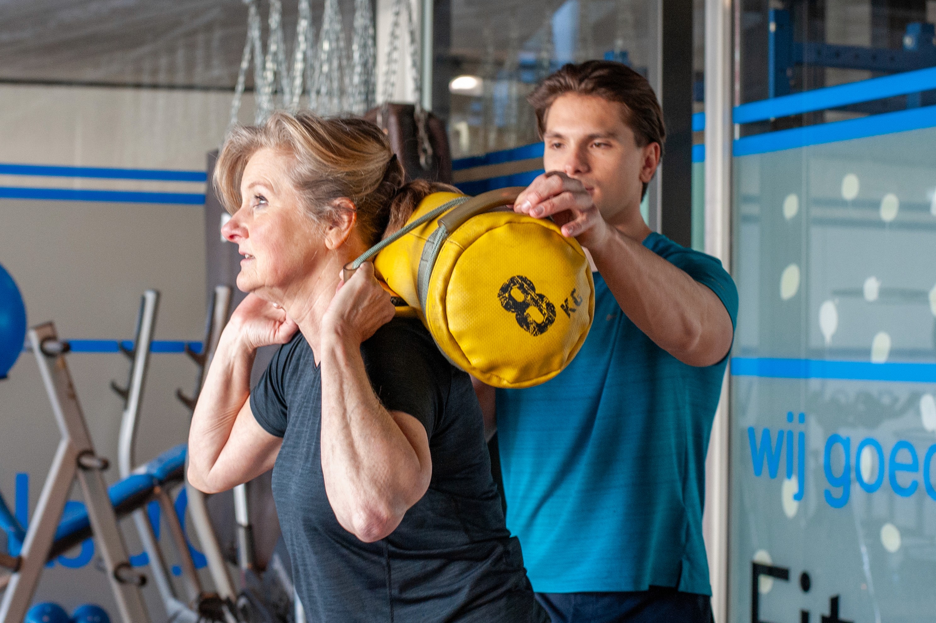 Rachel Stone, personal trainer and fitness coach, smiling in natural light