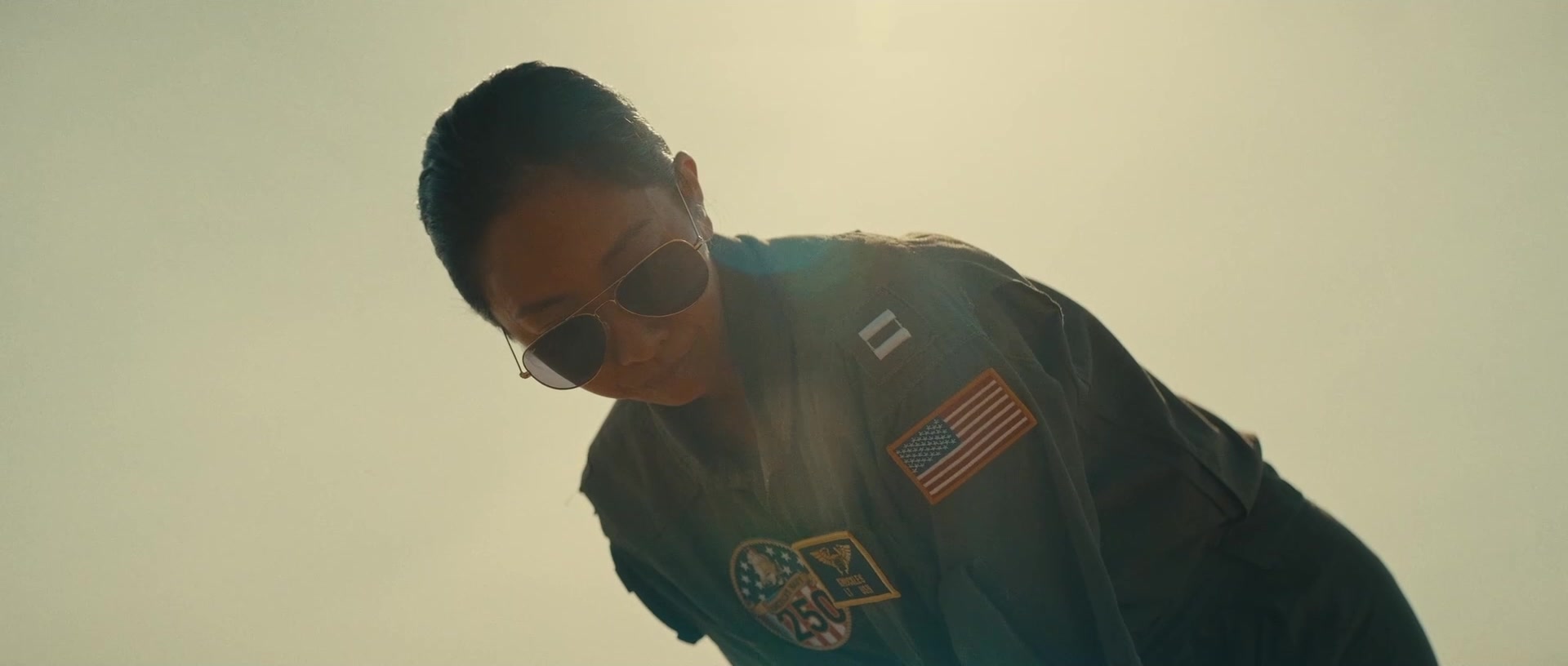 Jessica Moy as a Navy pilot in NASCAR vs Navy