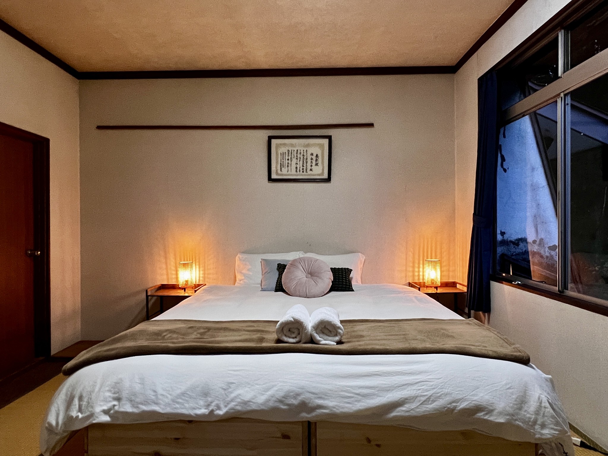 A cosy room with traditional Japanese design elements. The twin beds can be joined to create a spacious king bed. Ideal for couples or friends seeking a cultural experience.