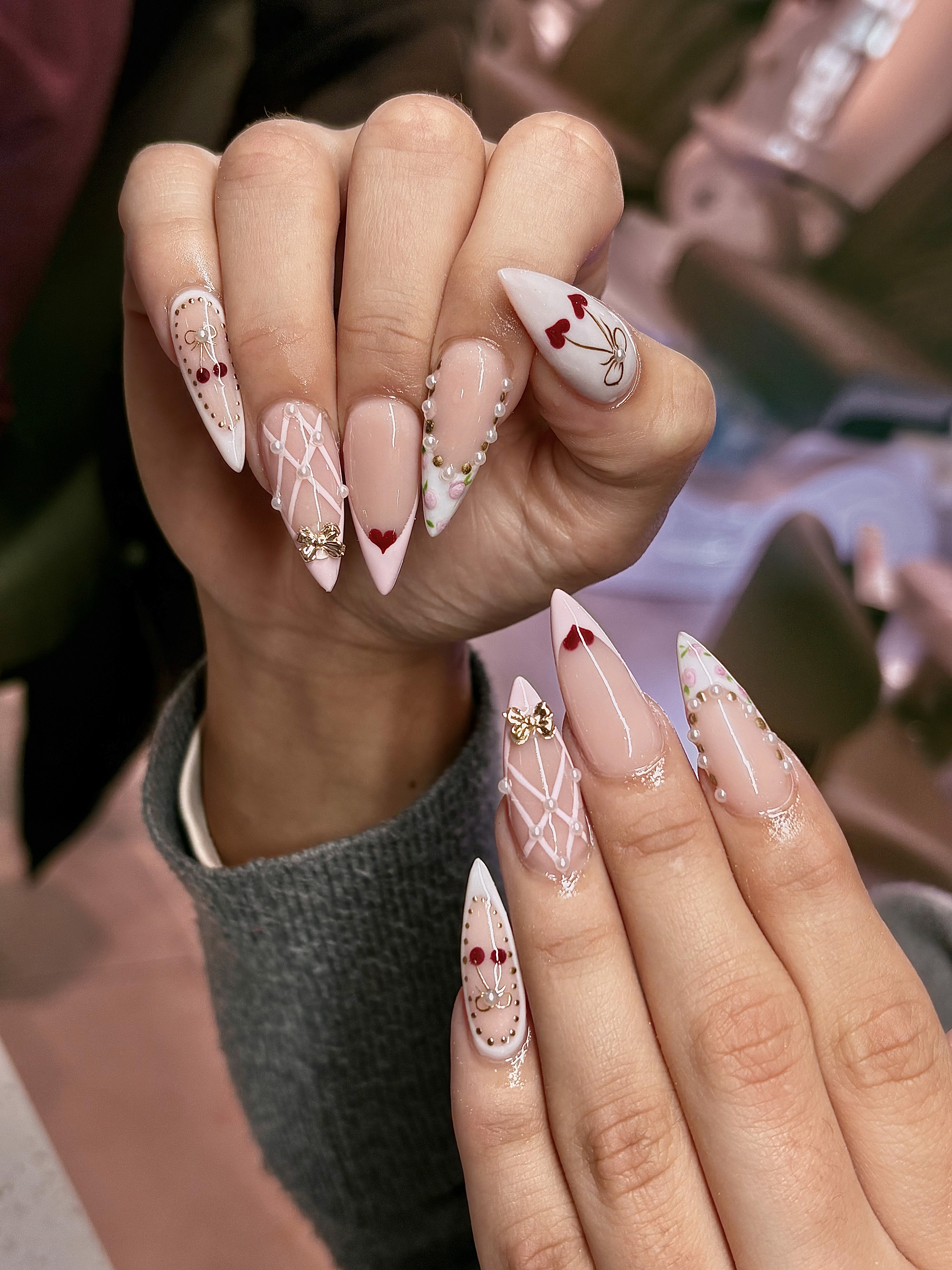 Gel-X French tip nails with heart design at Naperville IL nail salon