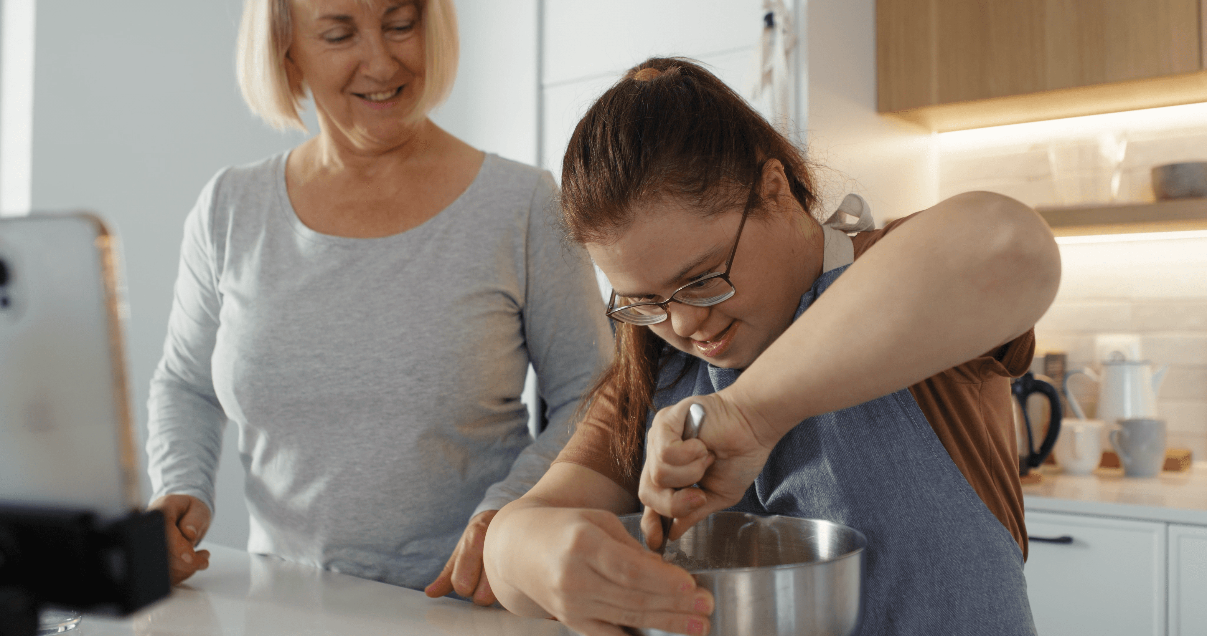 Two women baking together.