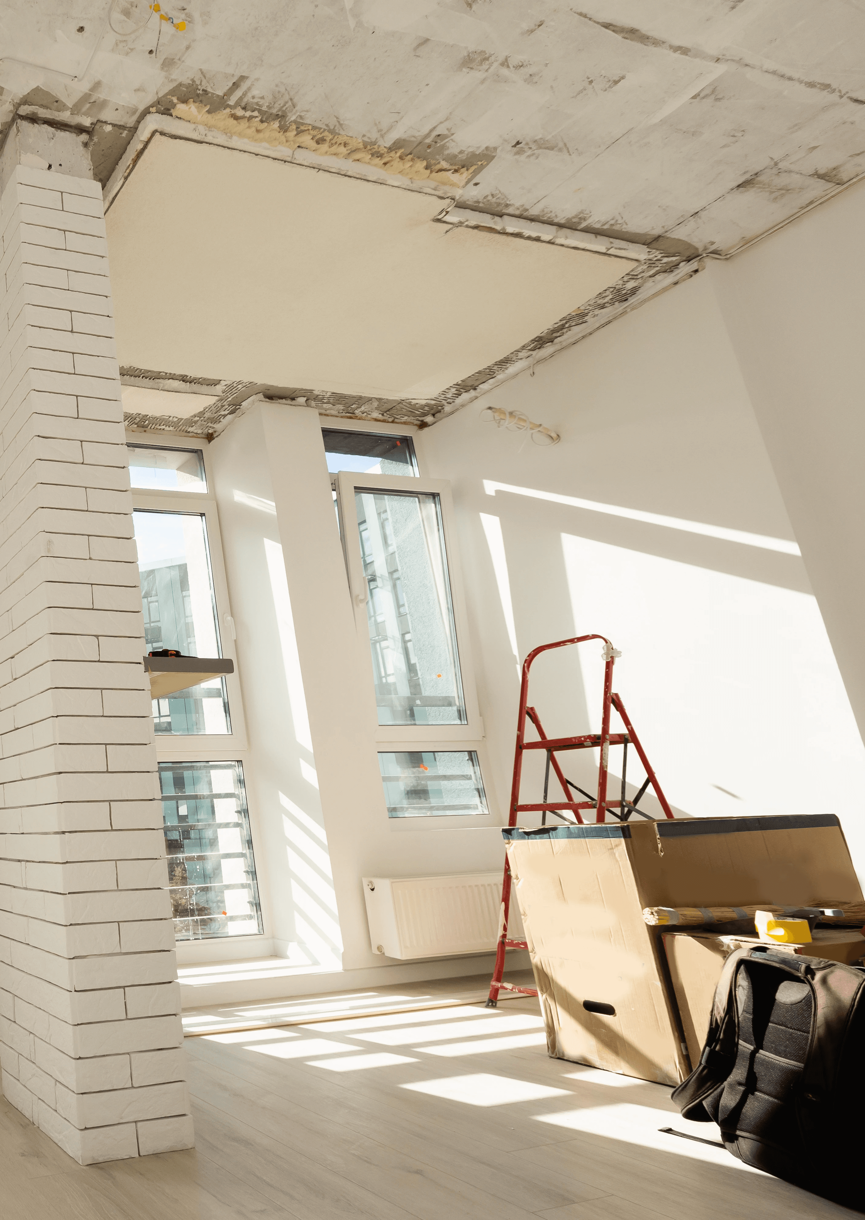 Close-up of a dark green leaf showing its textured surface and central vein against a muted background.