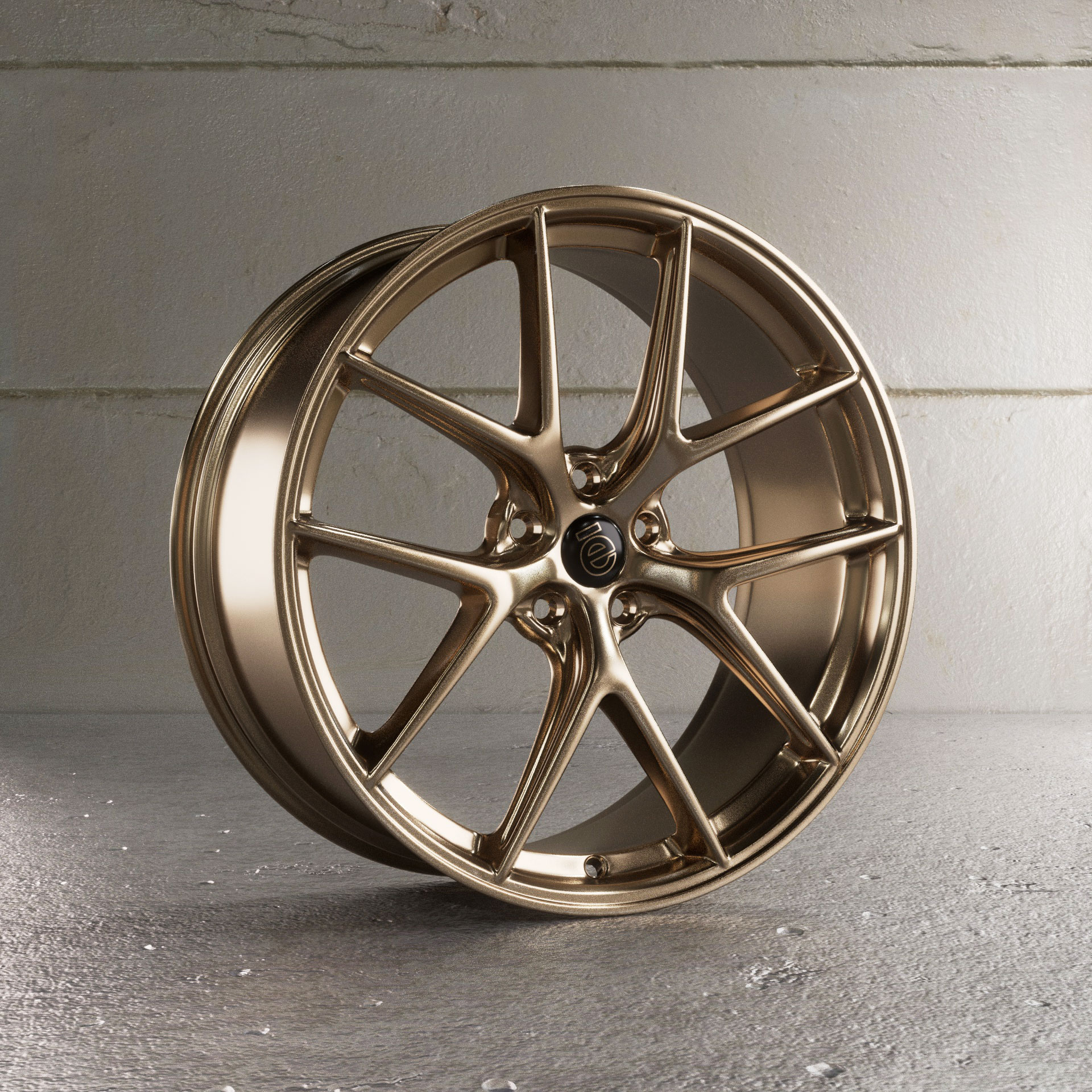 3D-Rendering der Felge in warmem Goldton mit Fokus auf Nabenzentrum und Oberflächenreflexionen