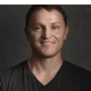 man in black and white nike zip up jacket smiling