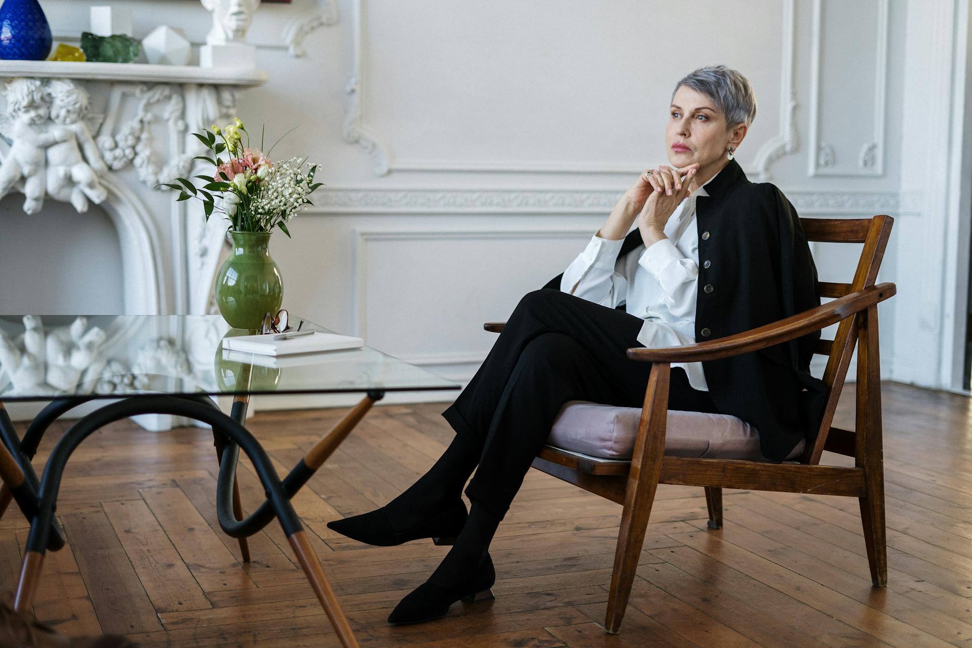 Portrait of Emily Hartwell, professional psychologist, sitting in her office in Barcelona