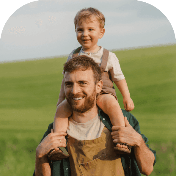 A father with his son on his shoulders