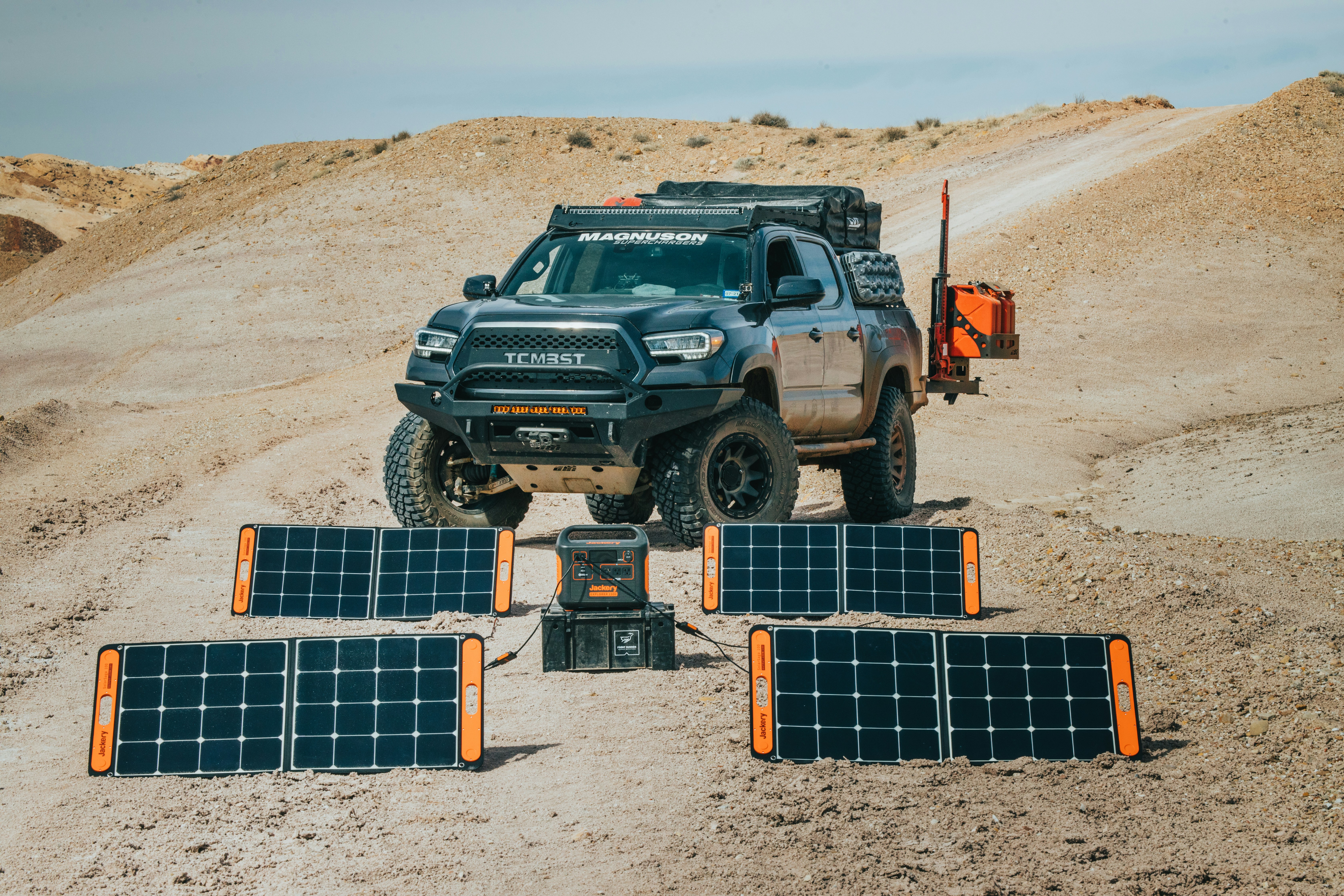 a truck on a sandy hill