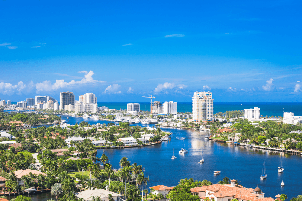 High school students in Florida conducting academic research with a mentor