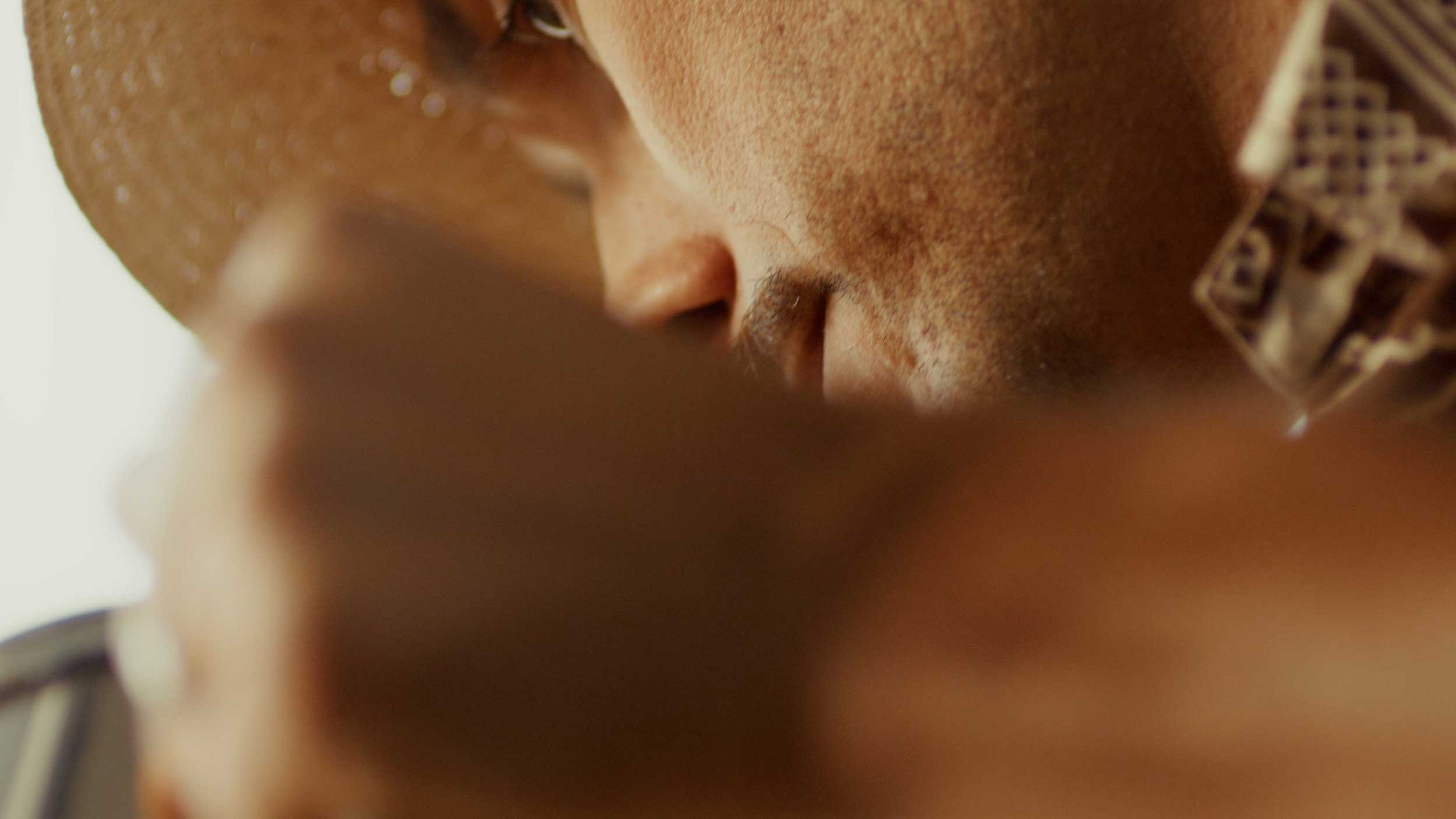 Streetside billboard with flyposters of the Batch.Works brand and illustrations