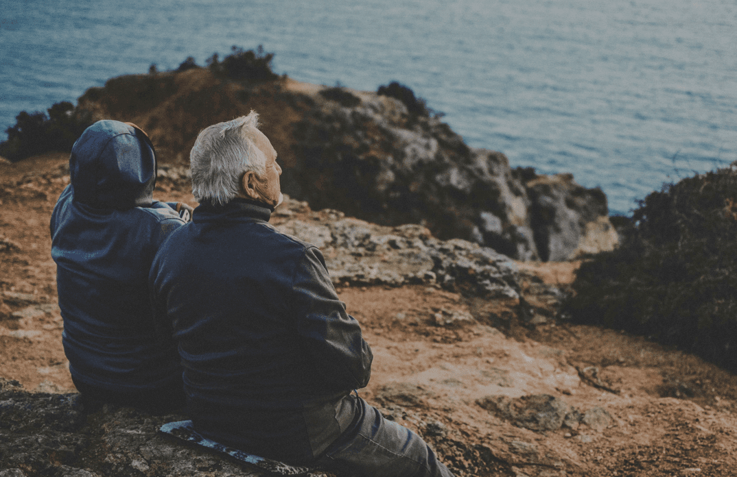 older couple overlooking sea