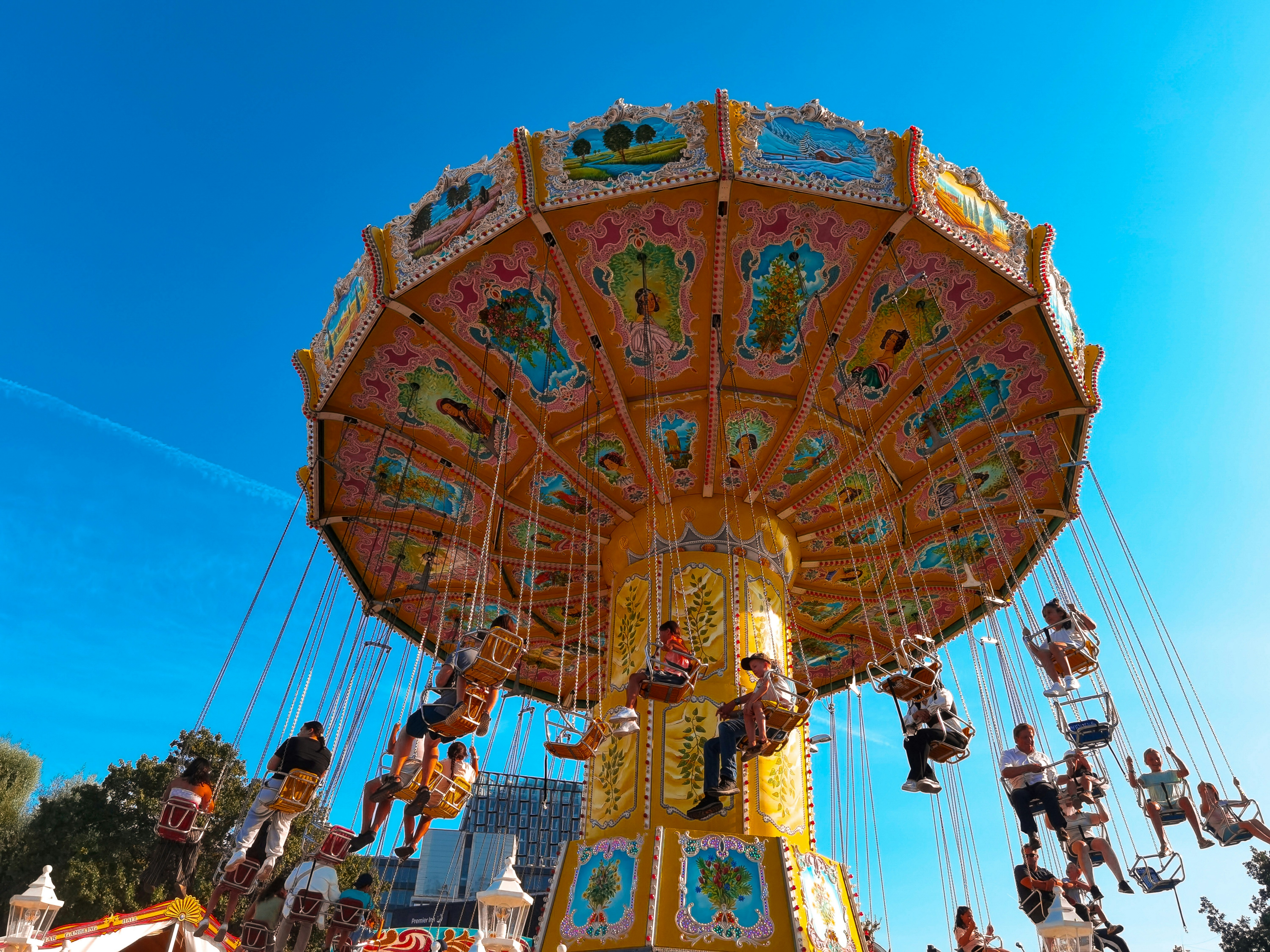 A carnival ride with people riding on it