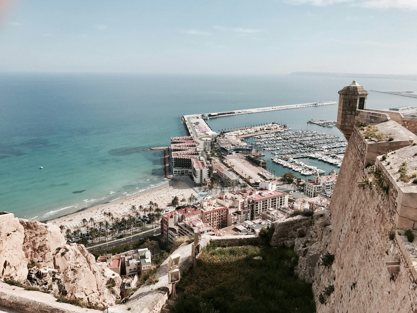 Coastal pier in Spain illustrating access, horizon and light considerations for location scouting