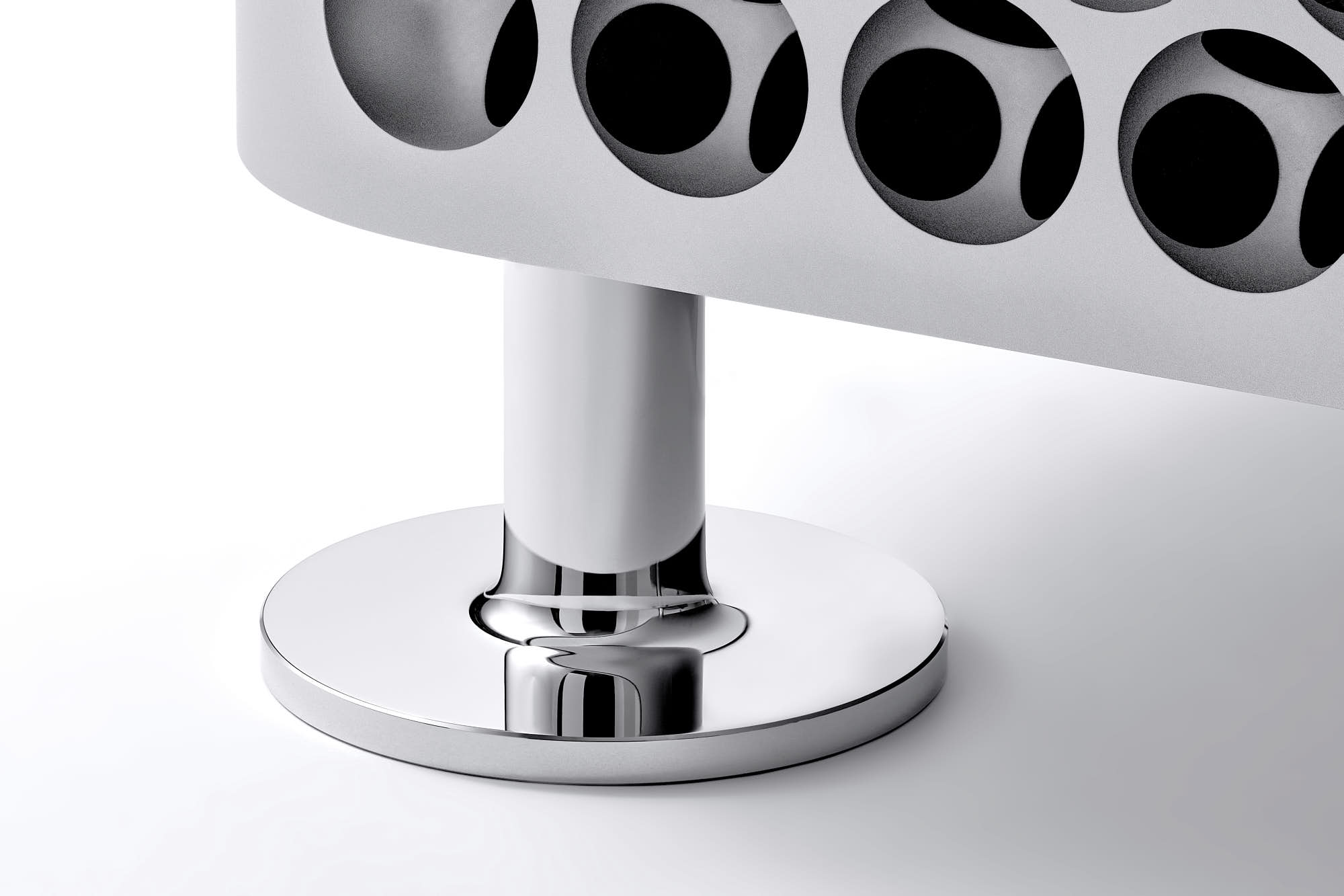 Chrome bar Mac Pro Computer foot base with sleek design.
