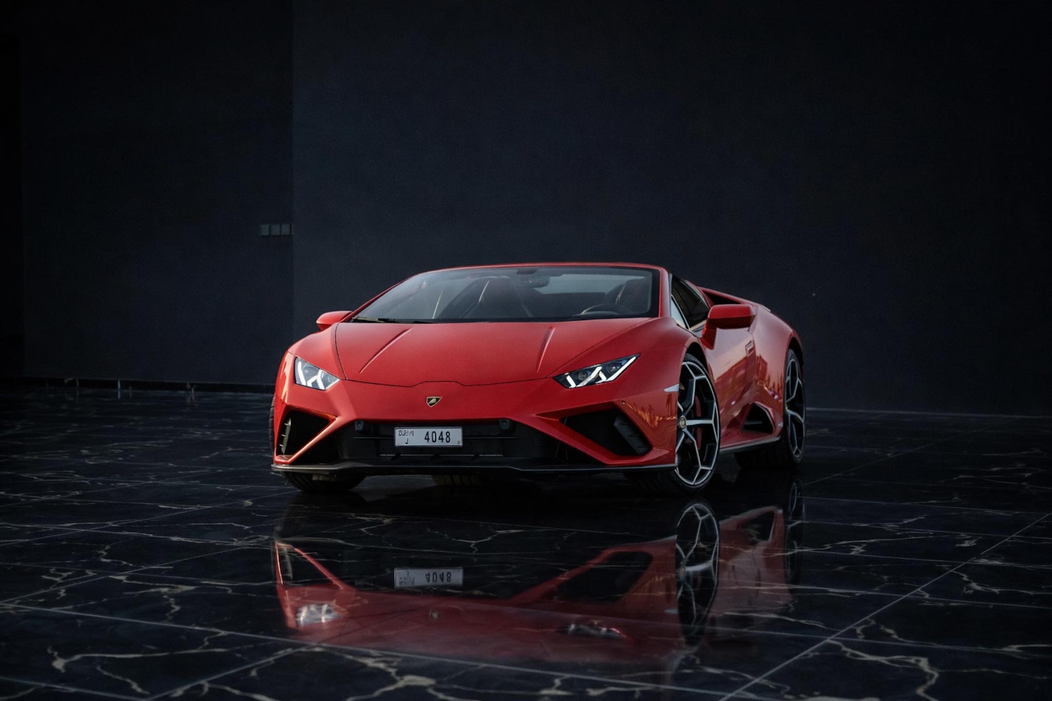 Lamborghini Huracán EVO Spyder red convertible driving experience in Dubai