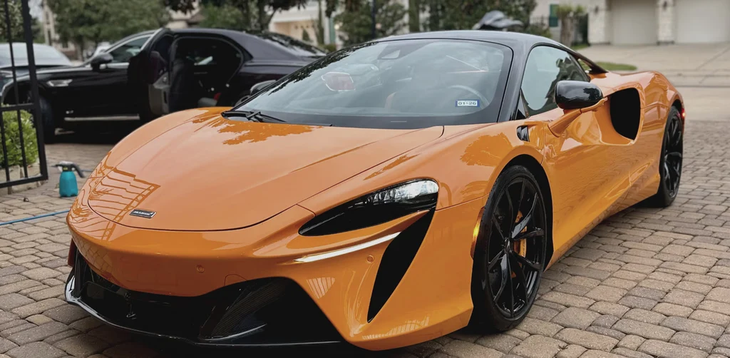 Orange Luxury car deteailed by LV Fresh Details in Houston