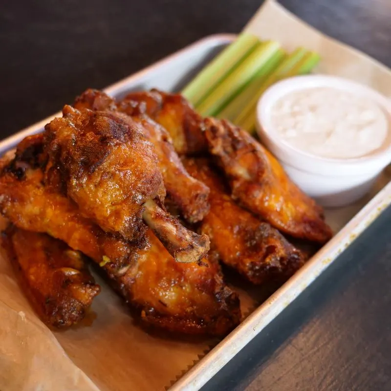 Fresh hot wings with bleu cheese dip and celery
