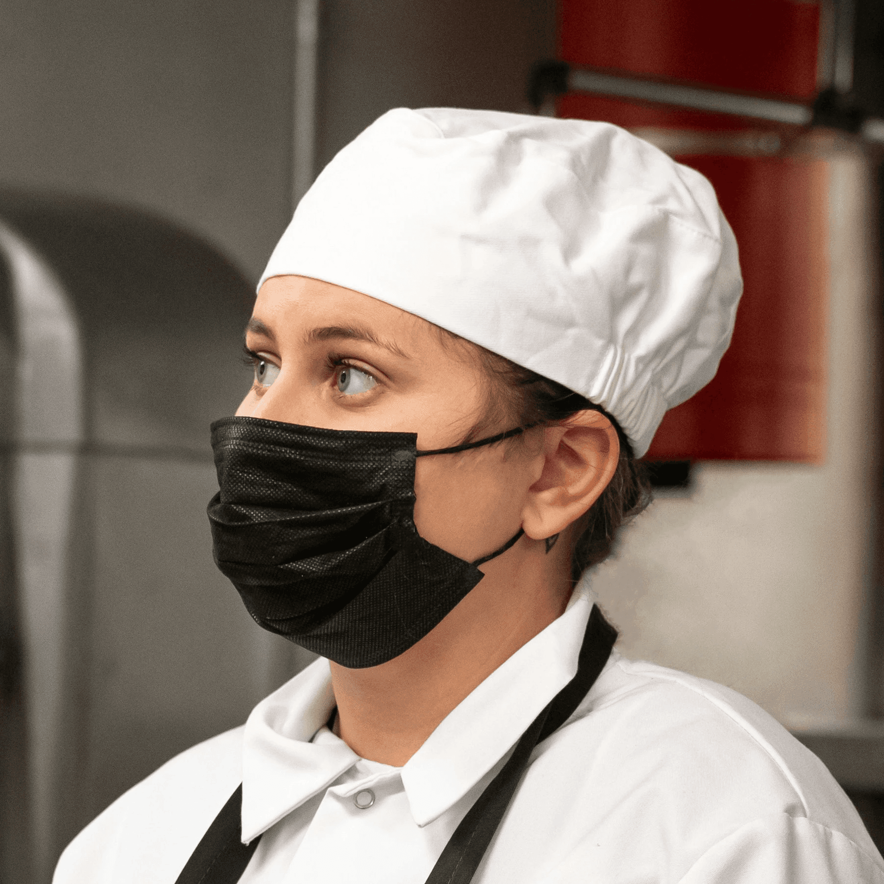 woman in white robe holding chopsticks