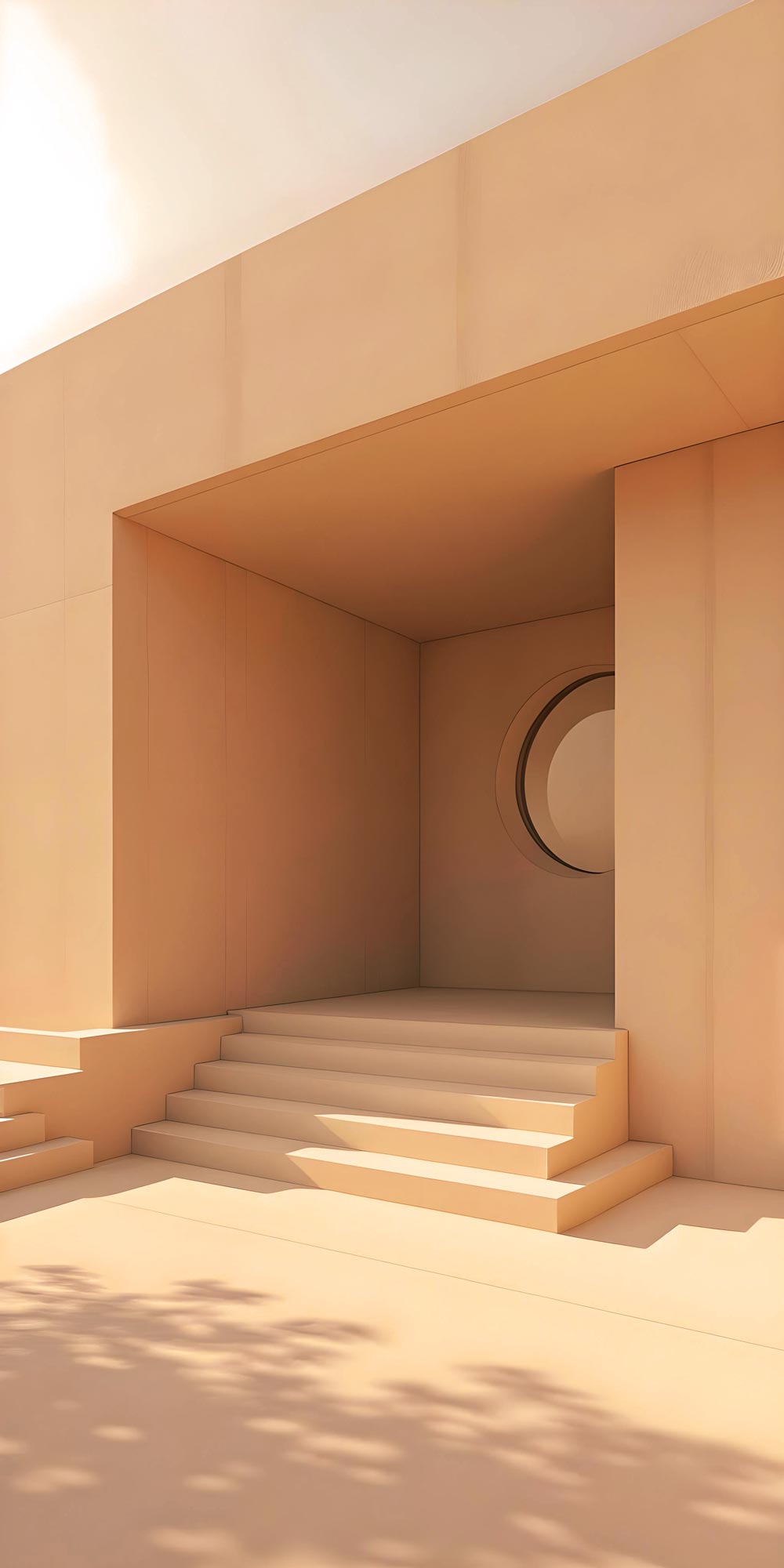 Minimalist entrance with warm beige render, clean steps, and a circular architectural cutout lit by daylight.