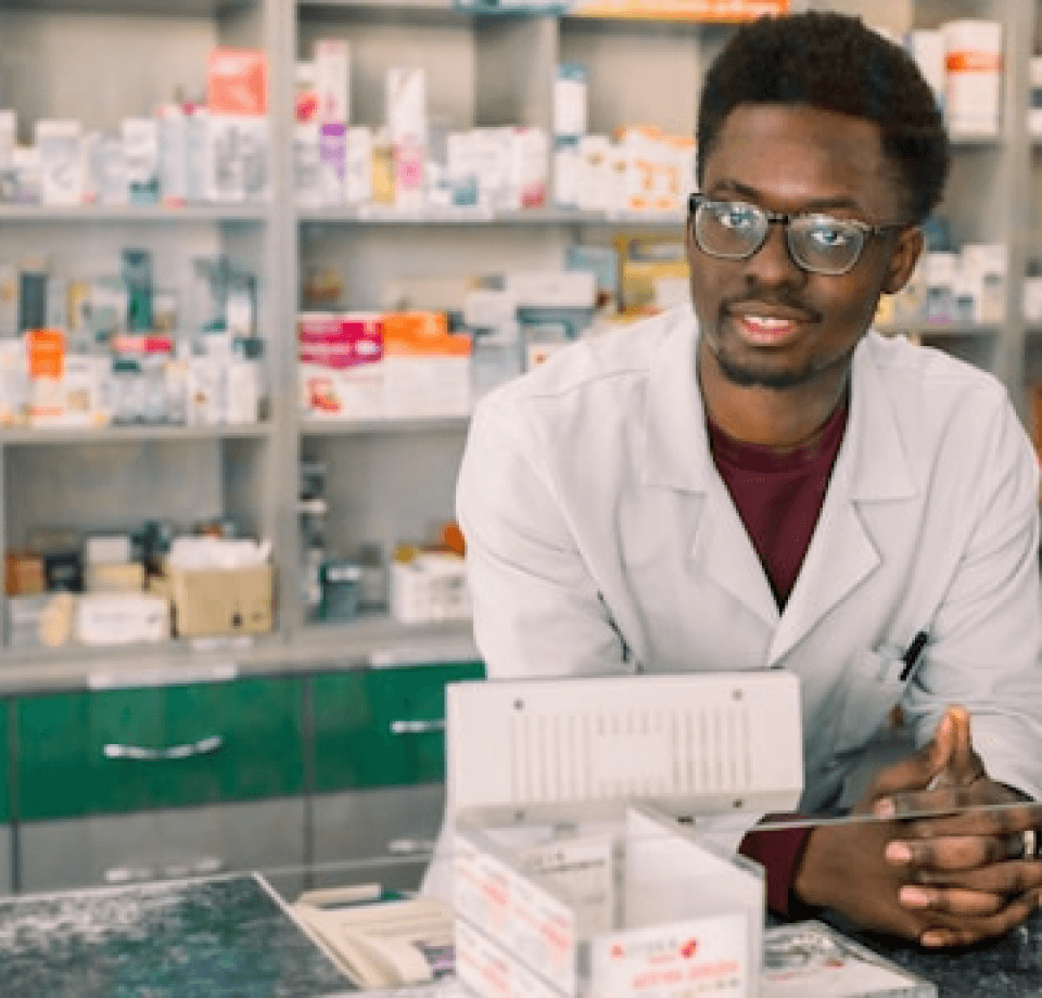 A pharmacist in a pharmacy store