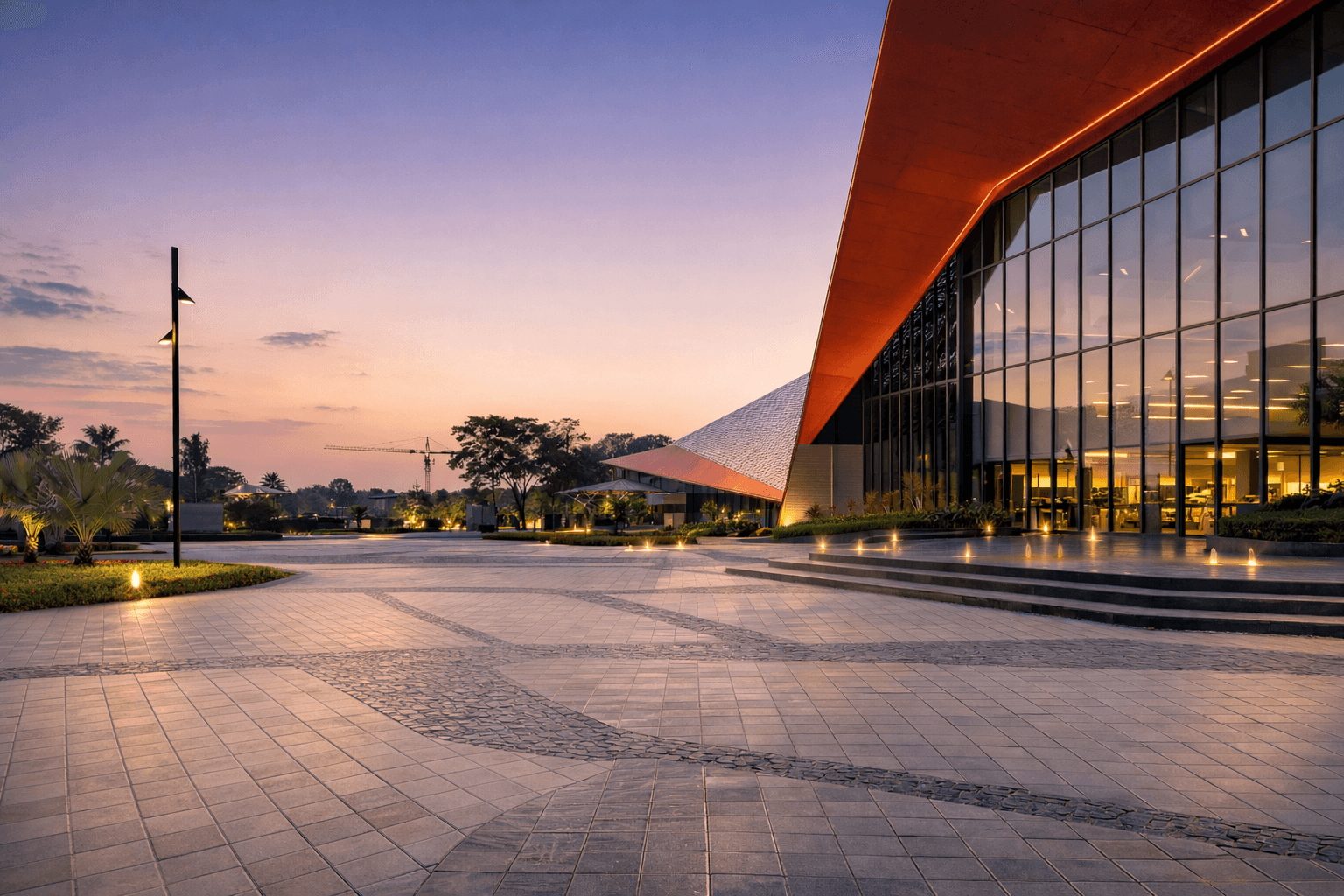 Modern commercial exterior with Egmore Black stone paving and structured landscape design