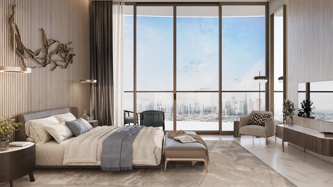 Spacious modern bedroom with a large bed and a prominent mirror, showcasing elegance at Mansory Residences.
