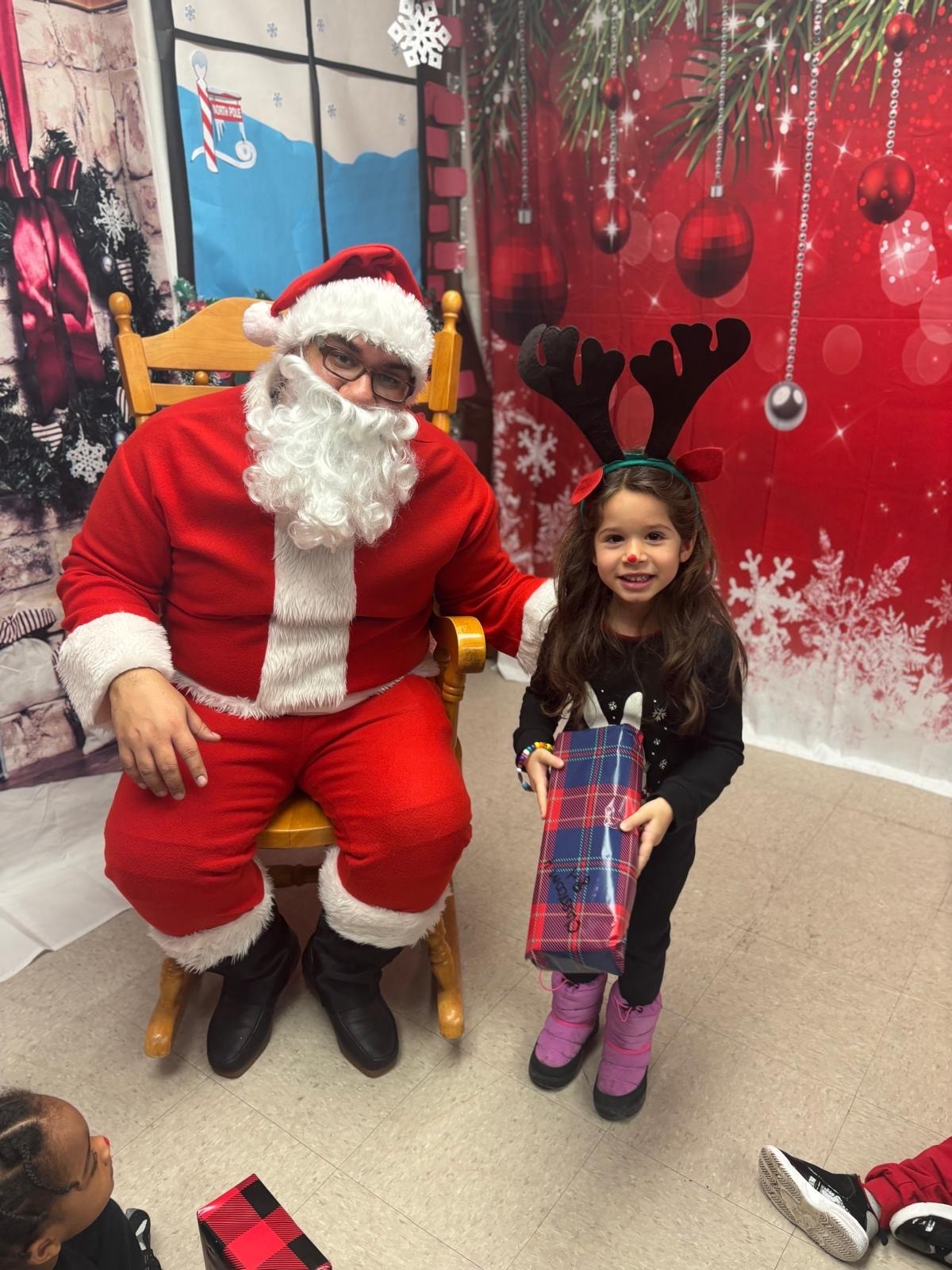 Bella Sanchez works on her custom cleat design.