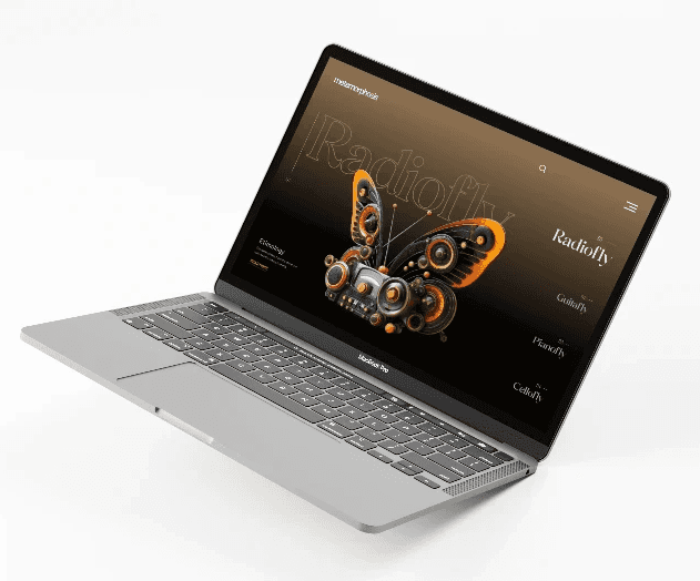 laptop with hero section design of speakers store