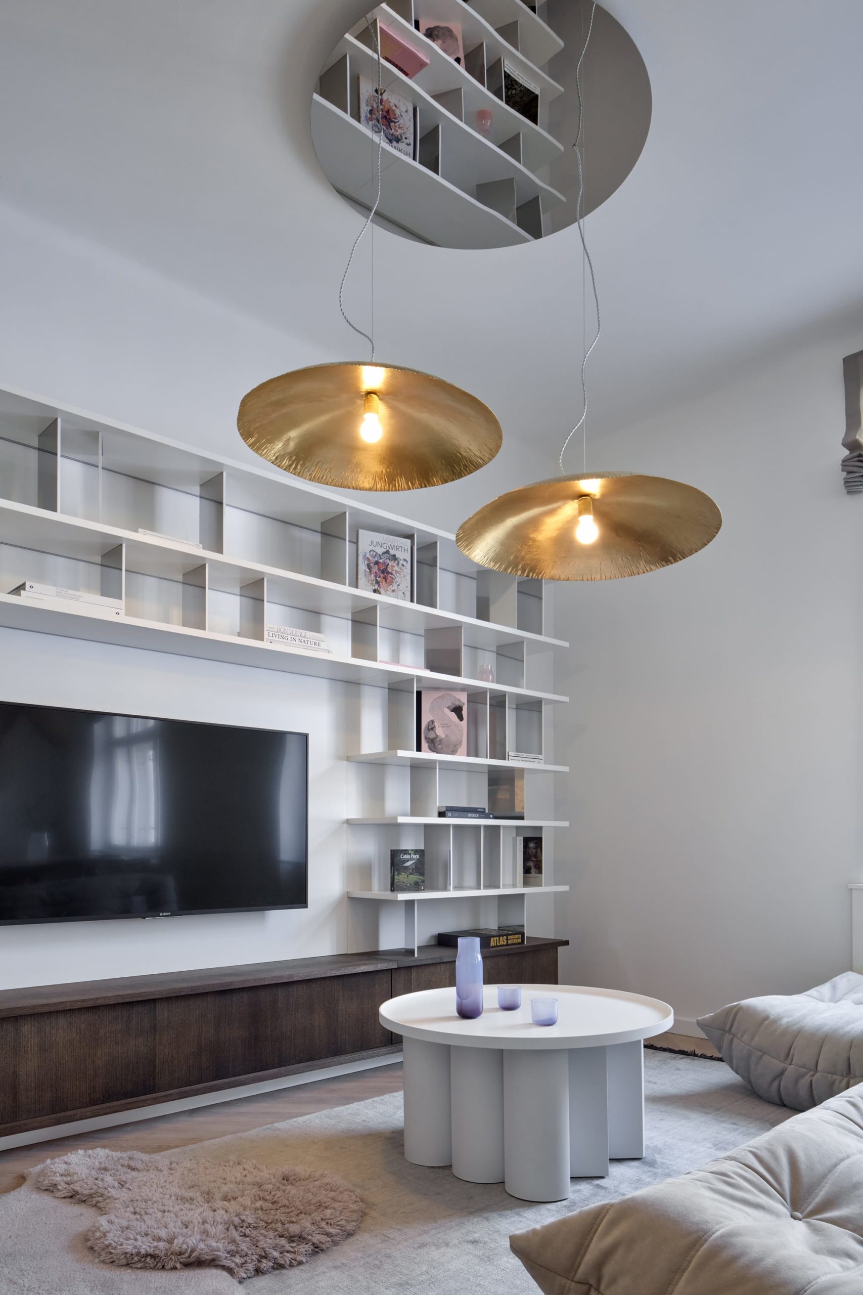 Stella table in interior setting defining space through sculptural form and clarity by Jiri Krejcirik