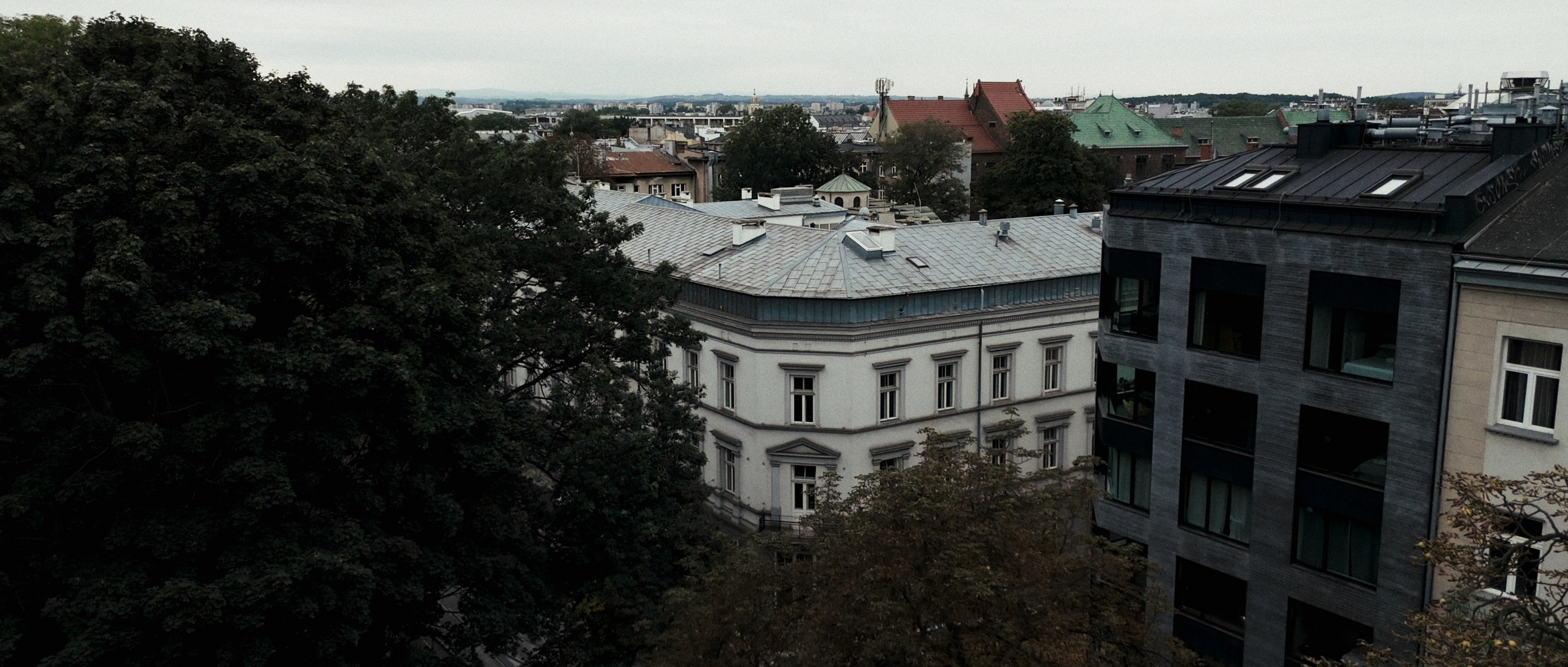 Exterior view of the AST National Academy of Theatre Arts building in Kraków, cinematic daylight shot.
