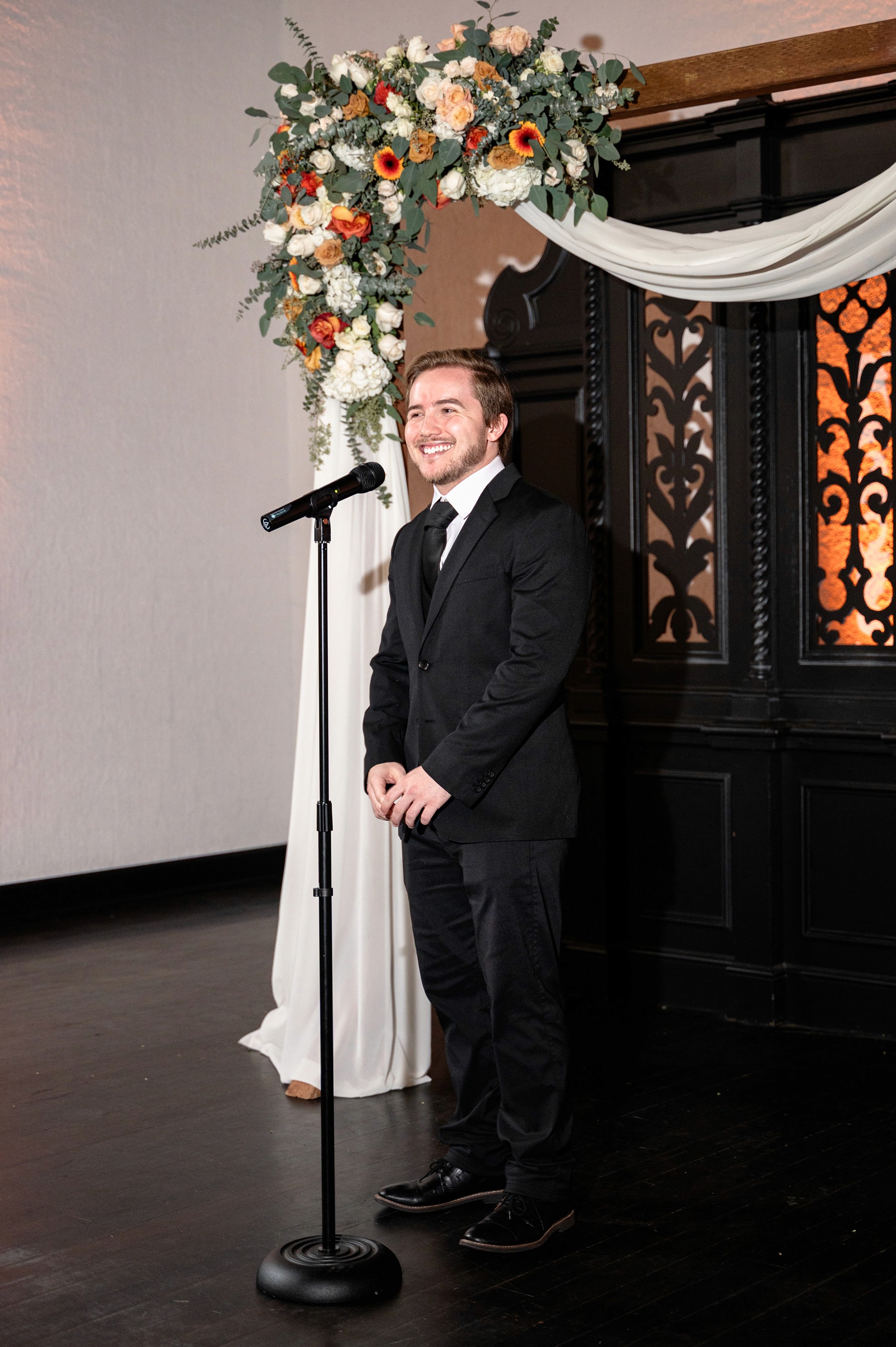 Flat lay wedding details with bouquet, rings, and sparkling bridal heels