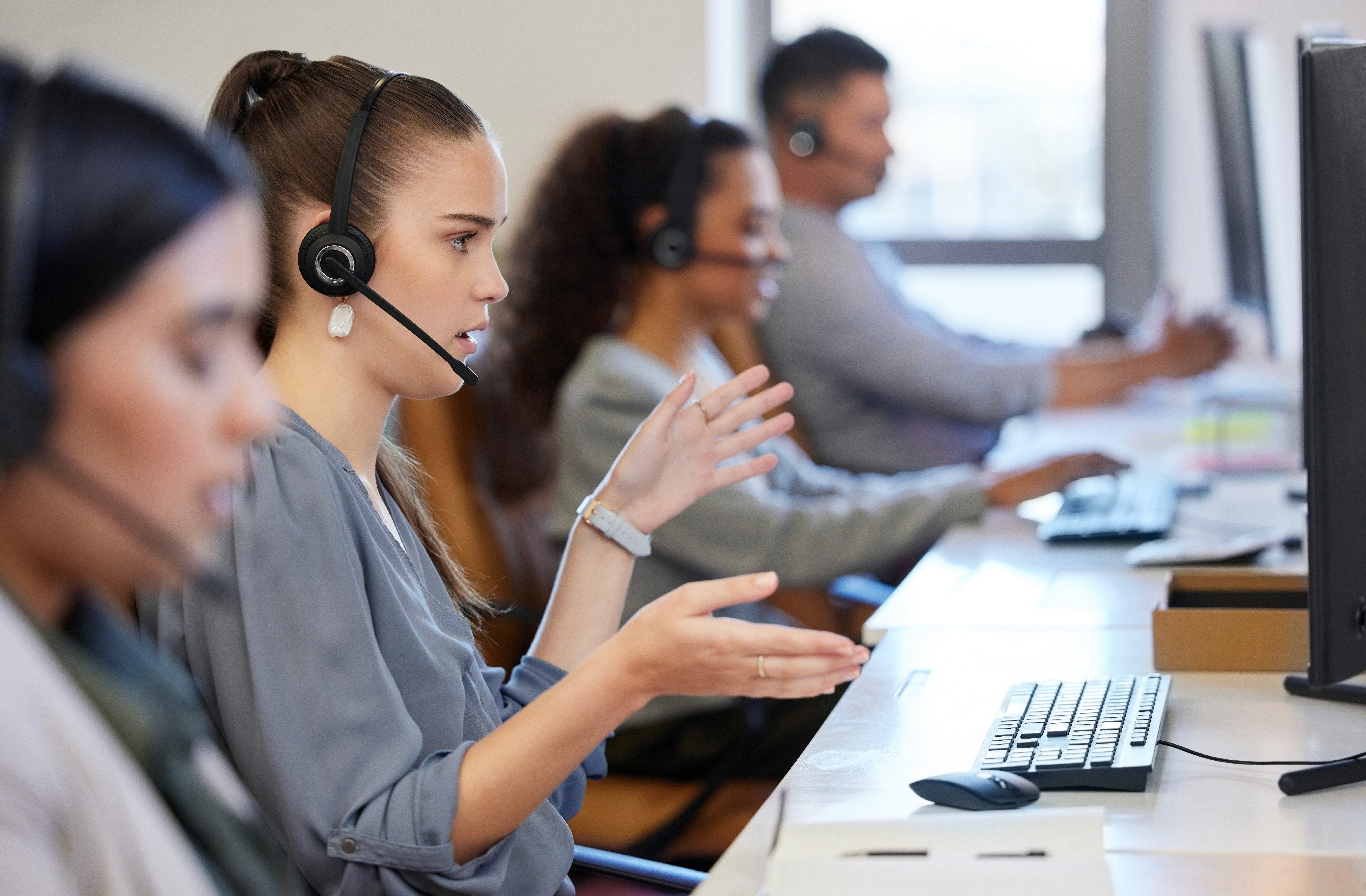 IT support engineer helping a business team