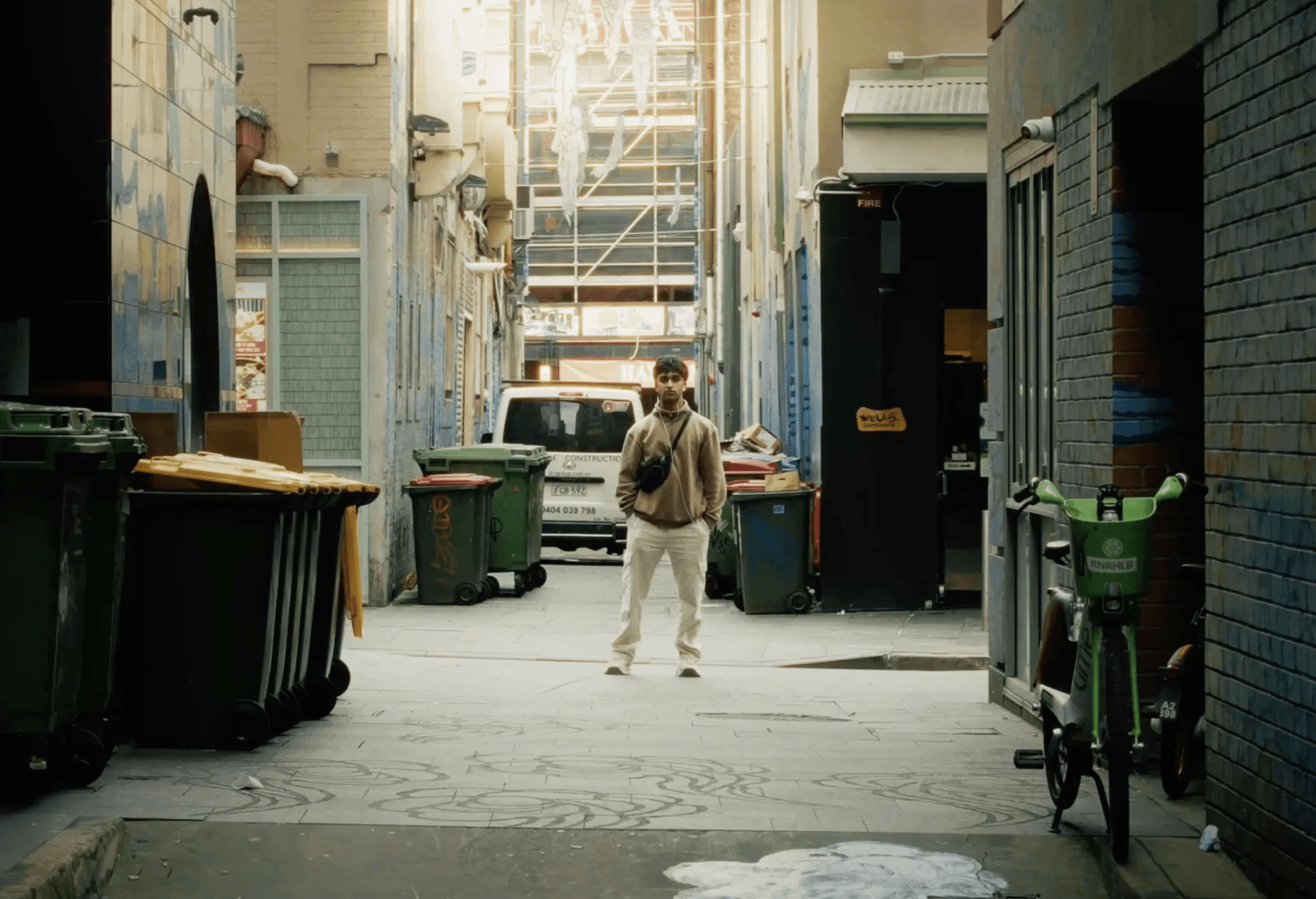 a blurry photo of a person standing in front of a wall