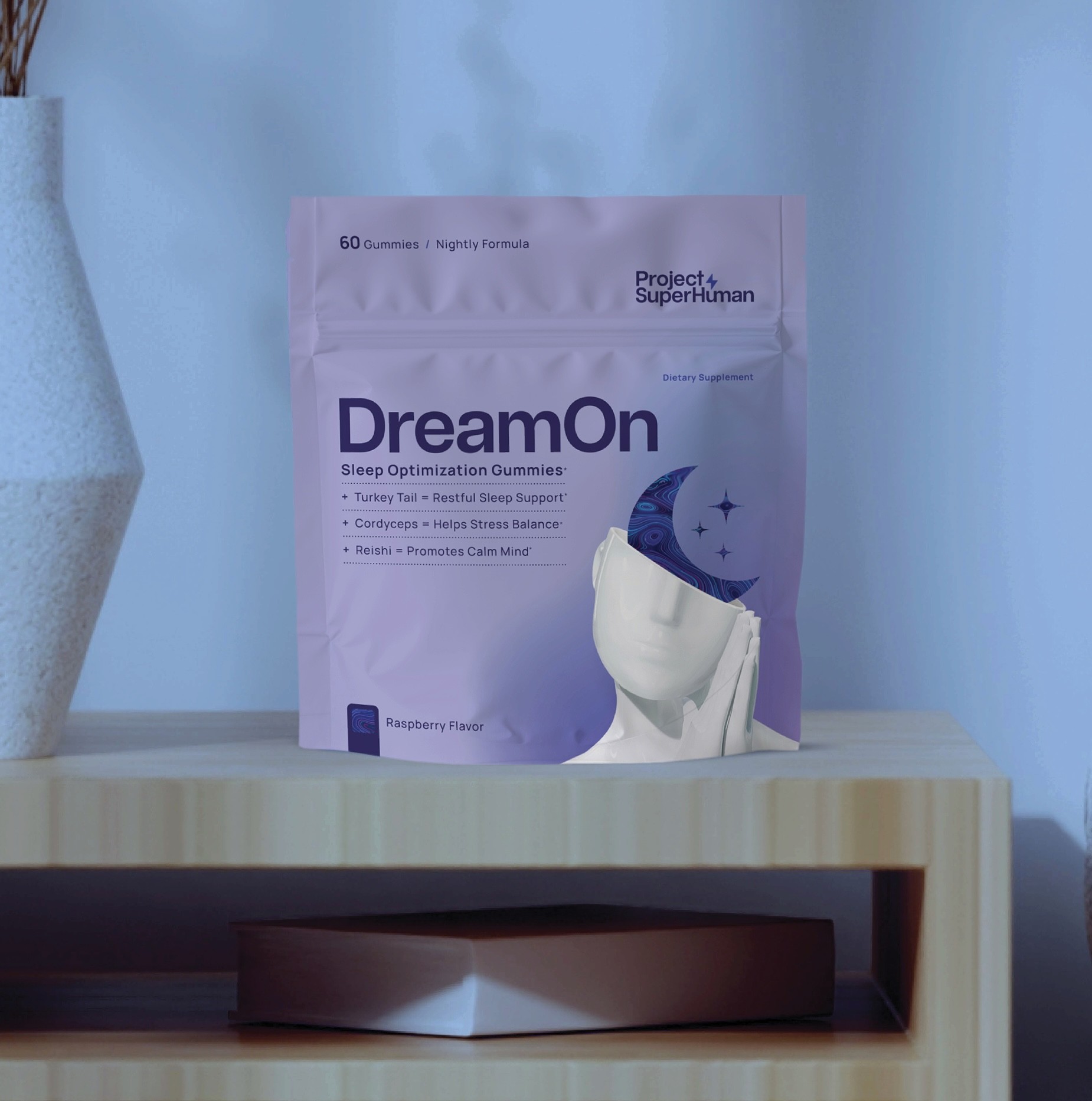 Stacked pink and red glass cosmetic jars on white—minimal skincare packaging display.