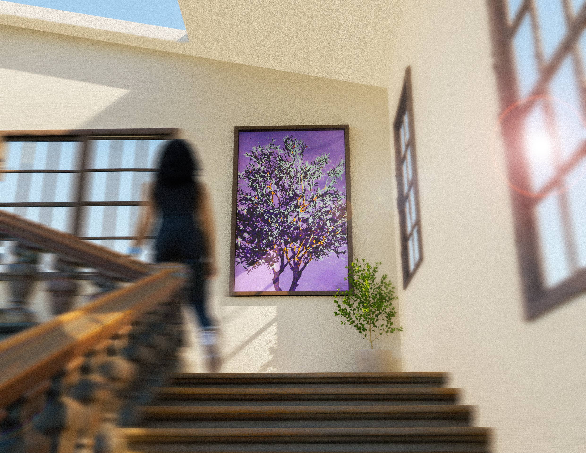 a sun filled stairway featuring the olive tree painting hung on the wall while a house tenant walks by
