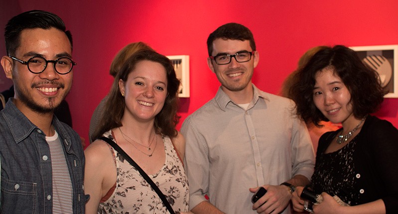 two men with glasses and two women
