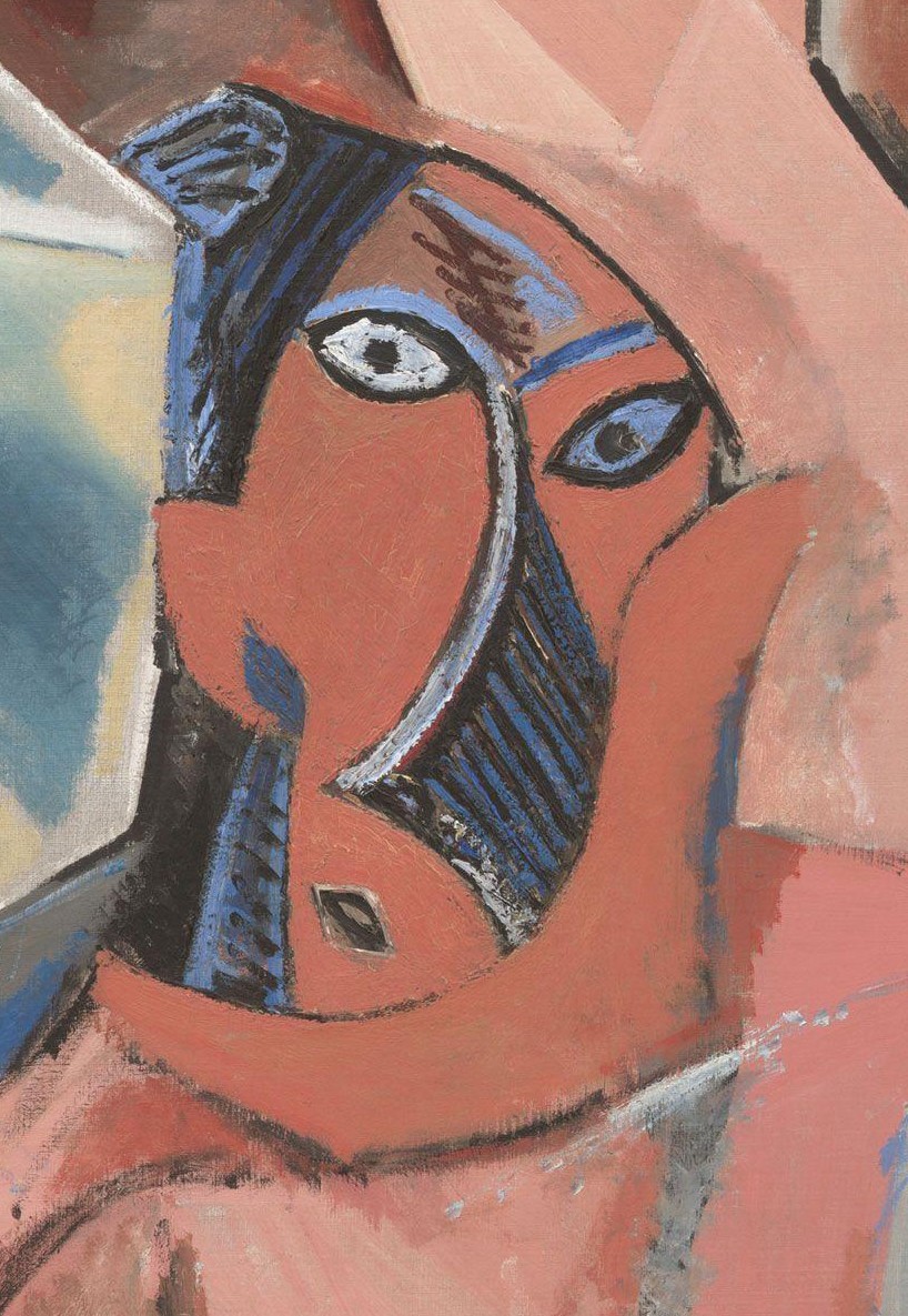 A close up of Pablo Picasso's painting Les Demoiselles d'Avignon, depicting a face with cubist perspective.