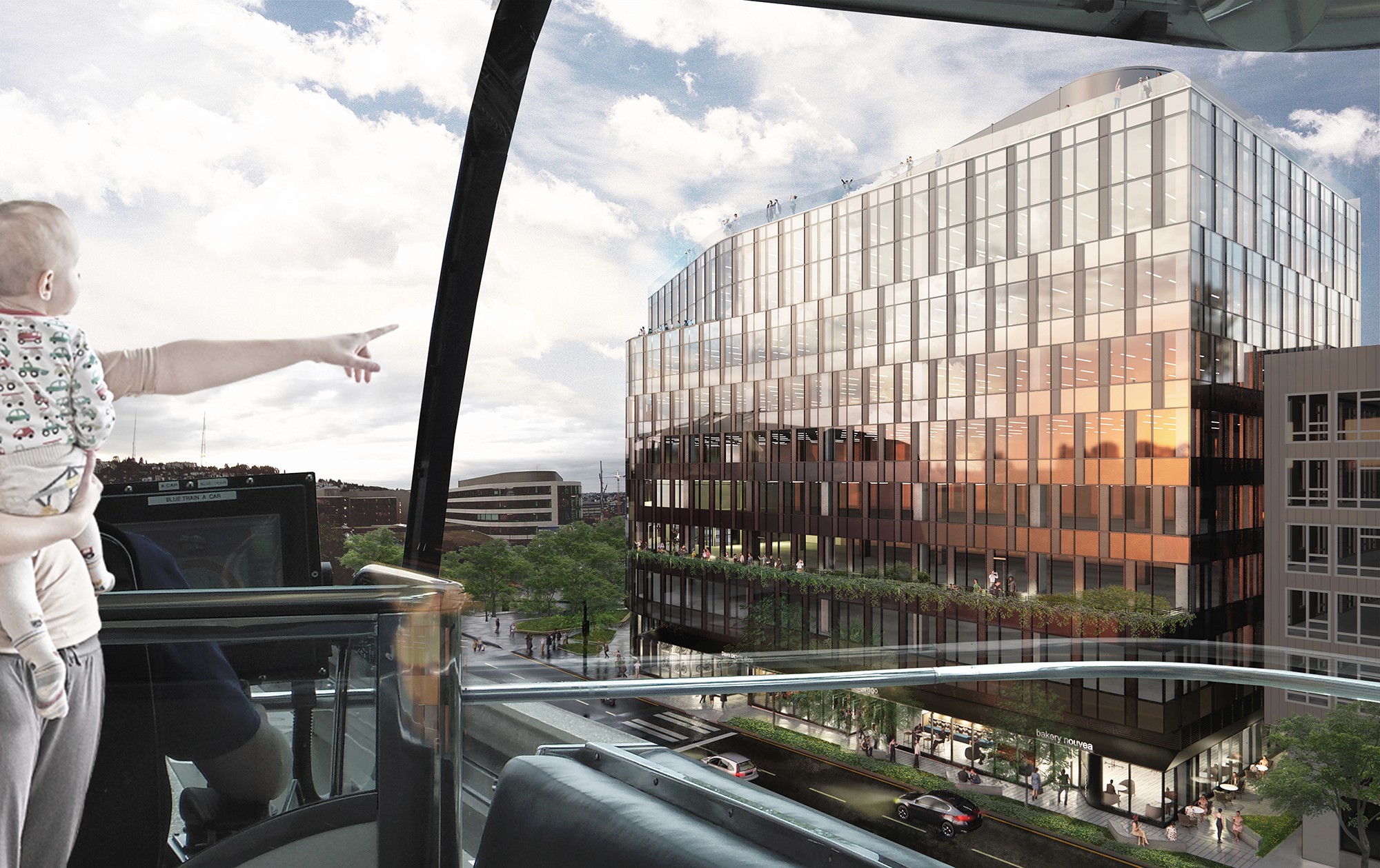 An adult and child admire the sleek, glowing west facade from the adjacent monorail.