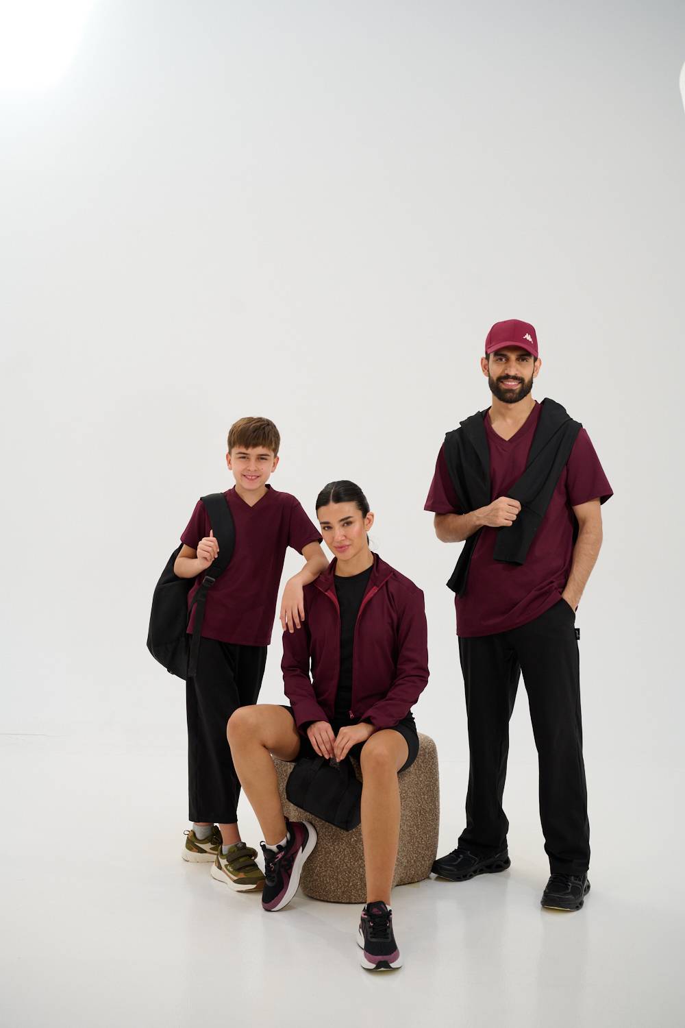 Friends laughing and posing inside a car