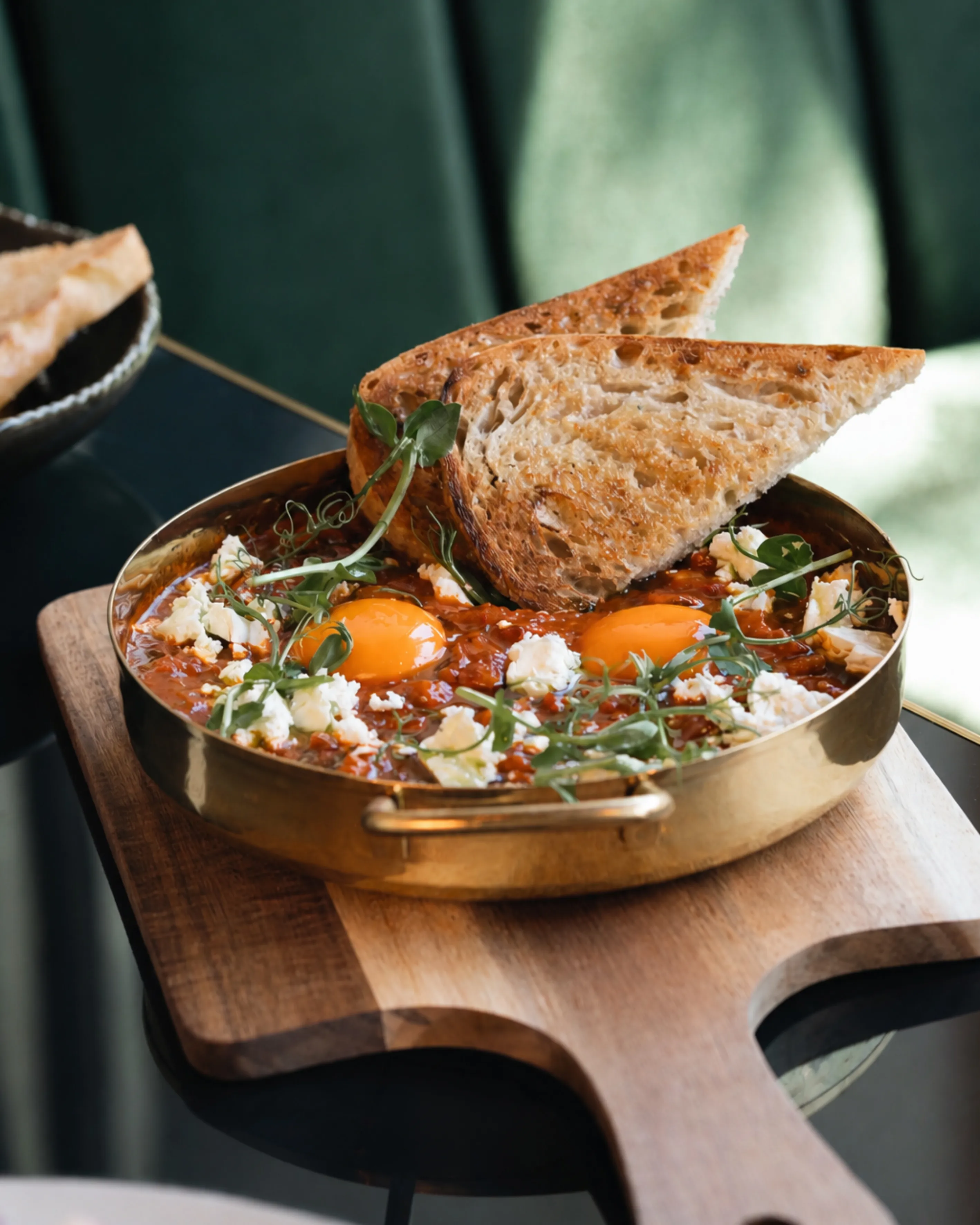 Shakshuka with toast and greens